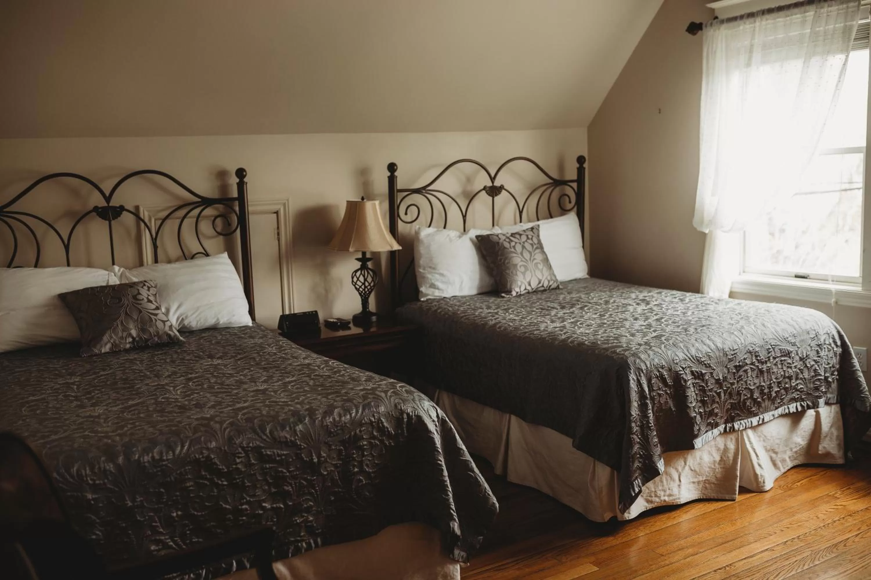Bedroom in Carriage House Inn Four and a Half Stars
