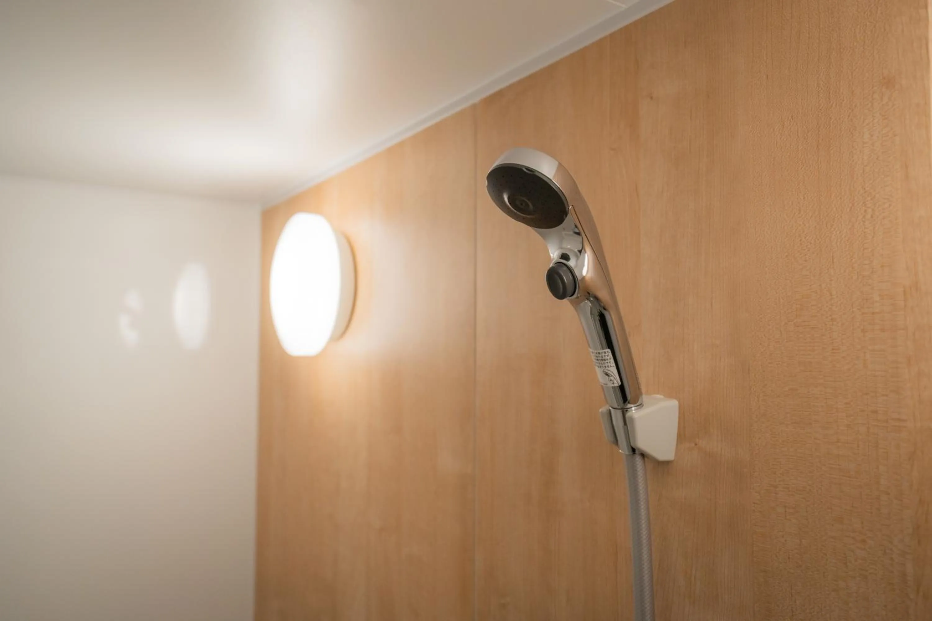 Shower in Higashikawa Asahidake Onsen Hotel Bear Monte