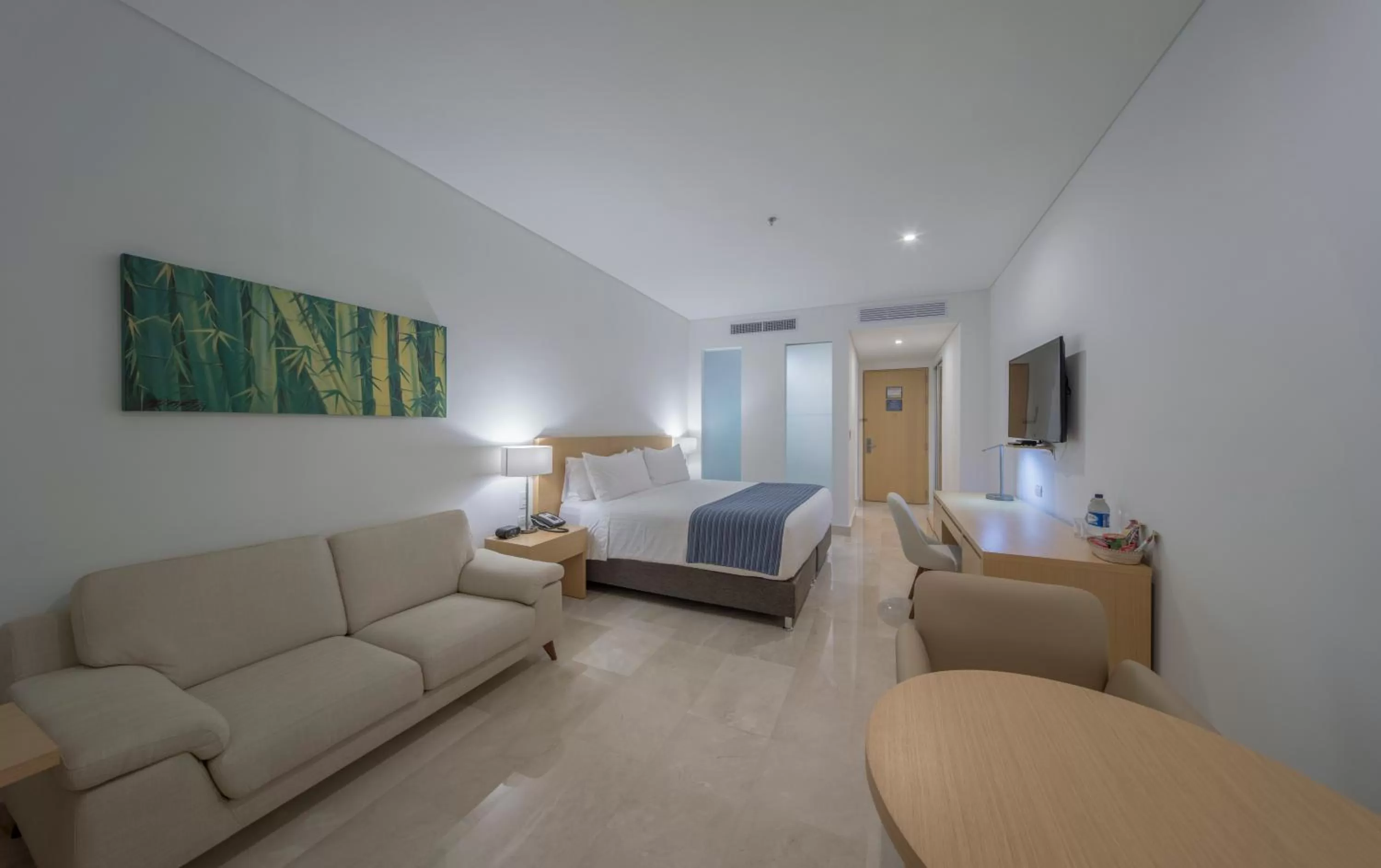 Photo of the whole room, Bed in Hotel Dann Carlton Barranquilla y Centro de Convenciones