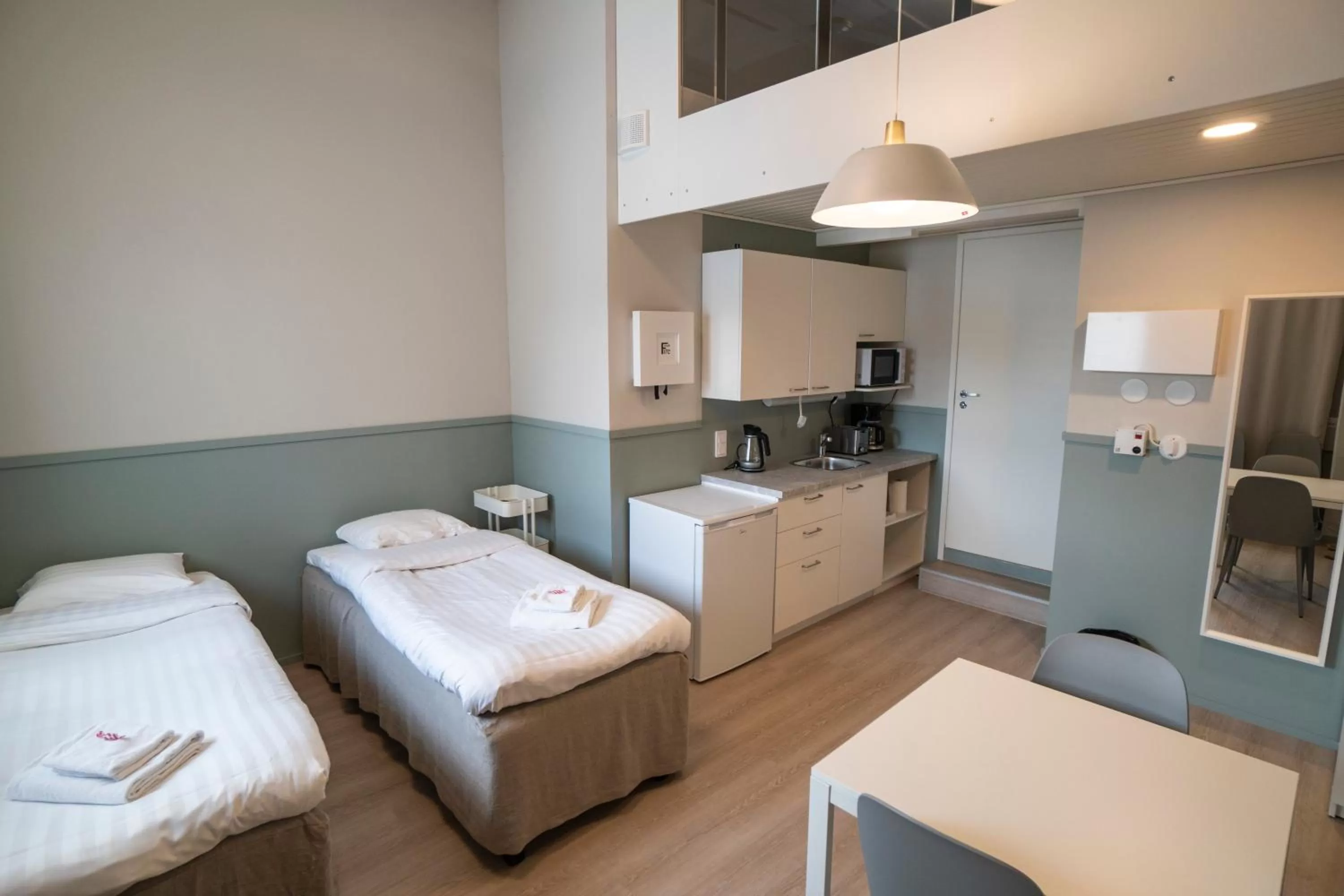Kitchen or kitchenette, Bed in Innotelli Apartments