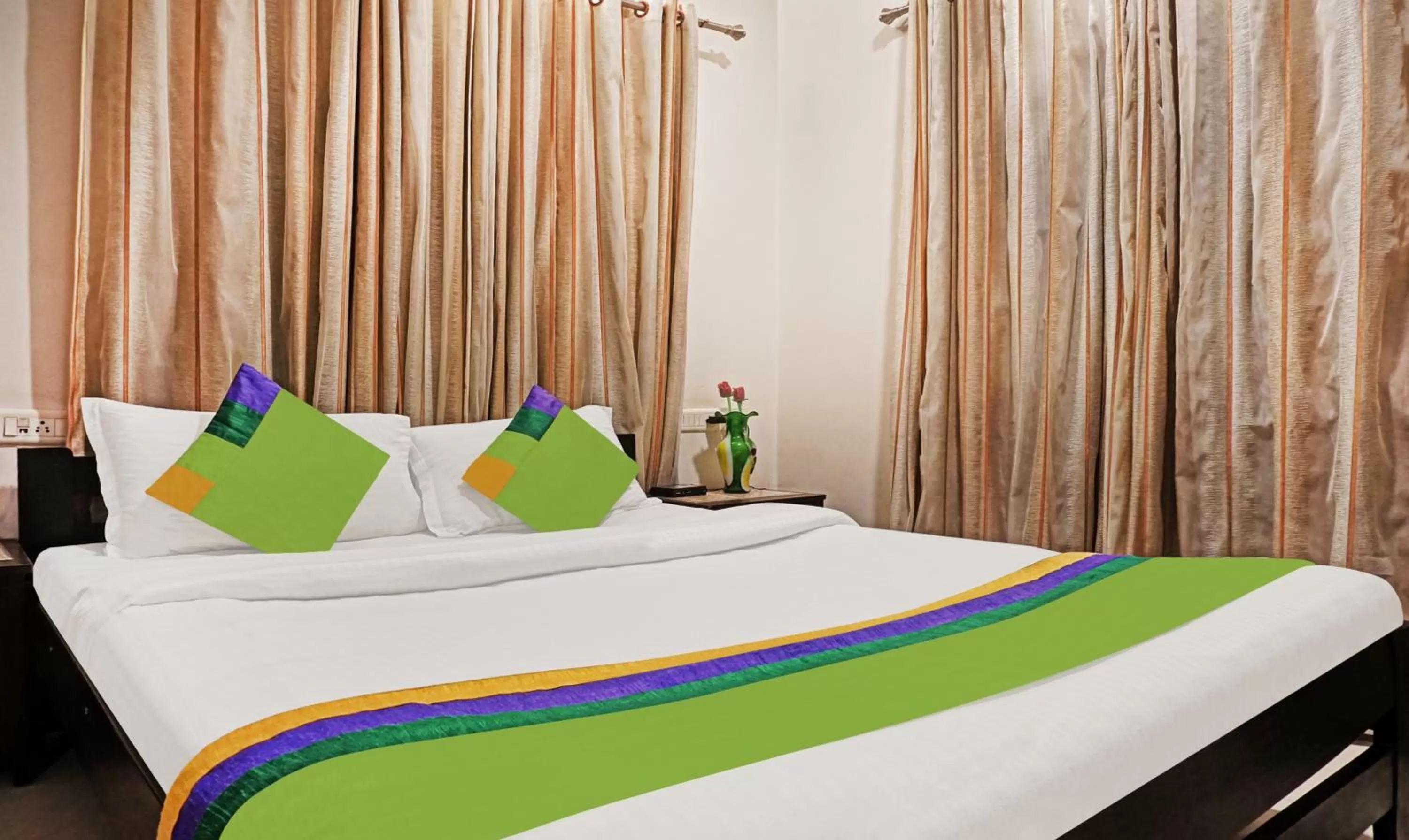 Bedroom, Bed in Treebo Excellent Home