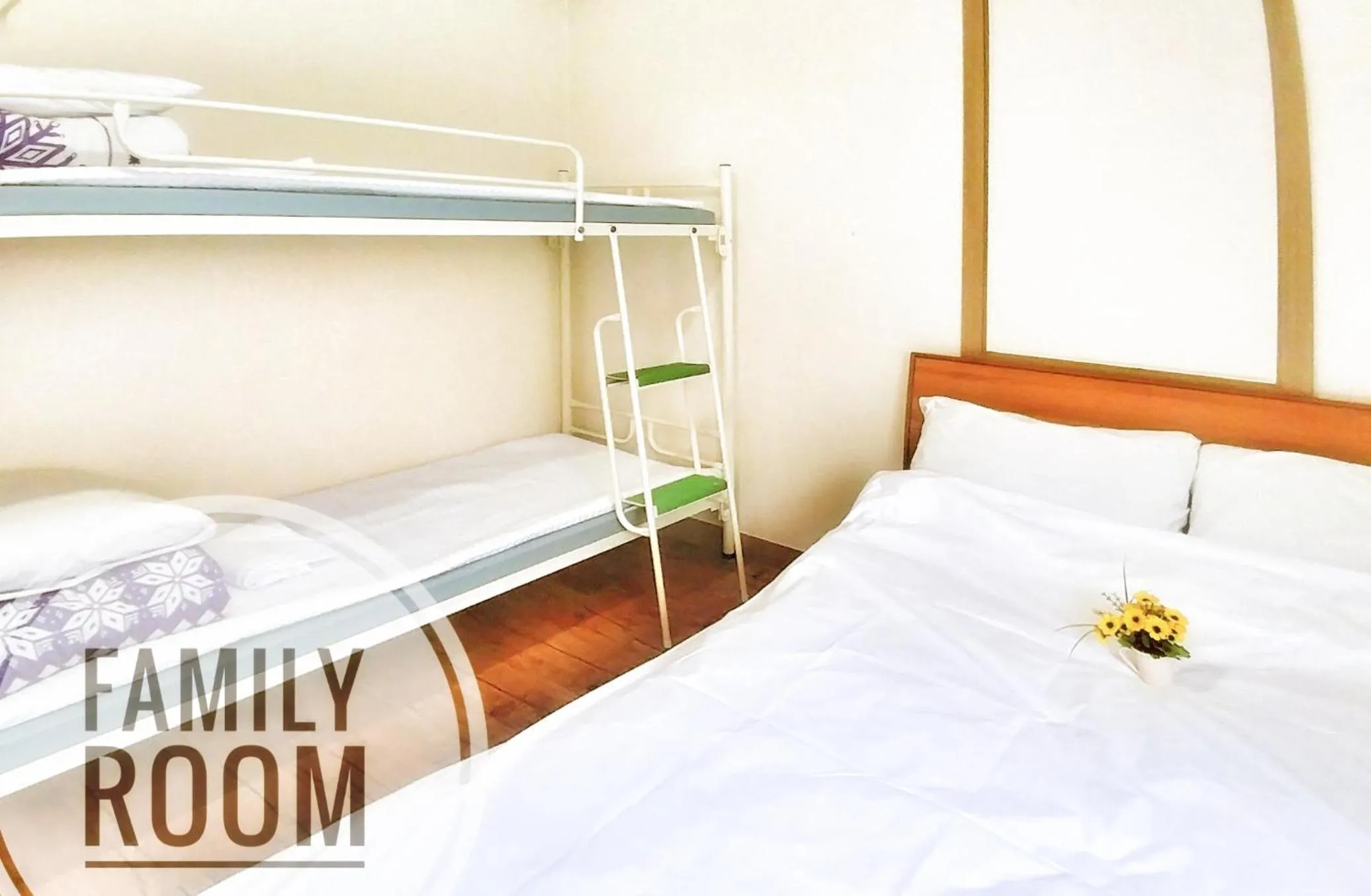 Bed in Jeju Masil Guesthouse