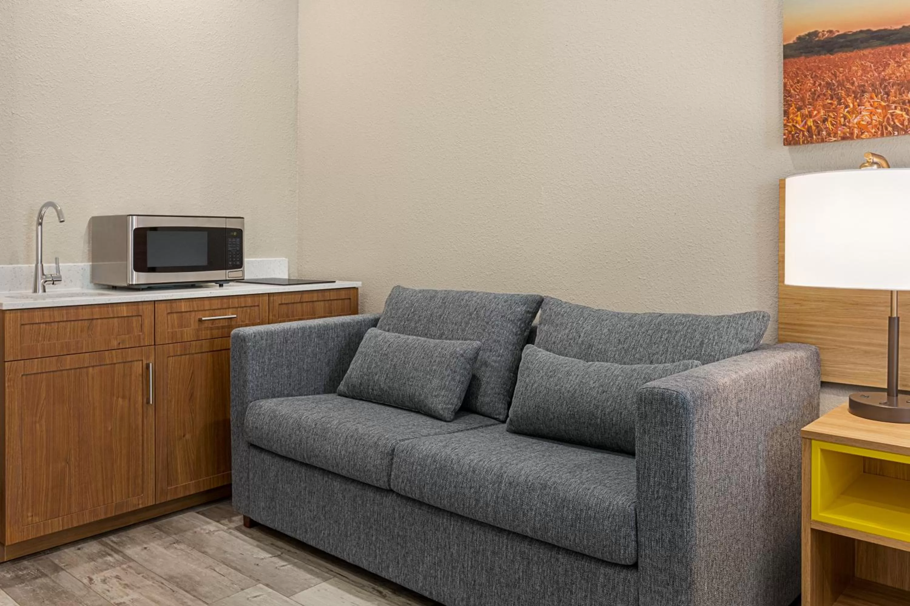 Kitchen or kitchenette in Days Inn & Suites by Wyndham Greater Tomball