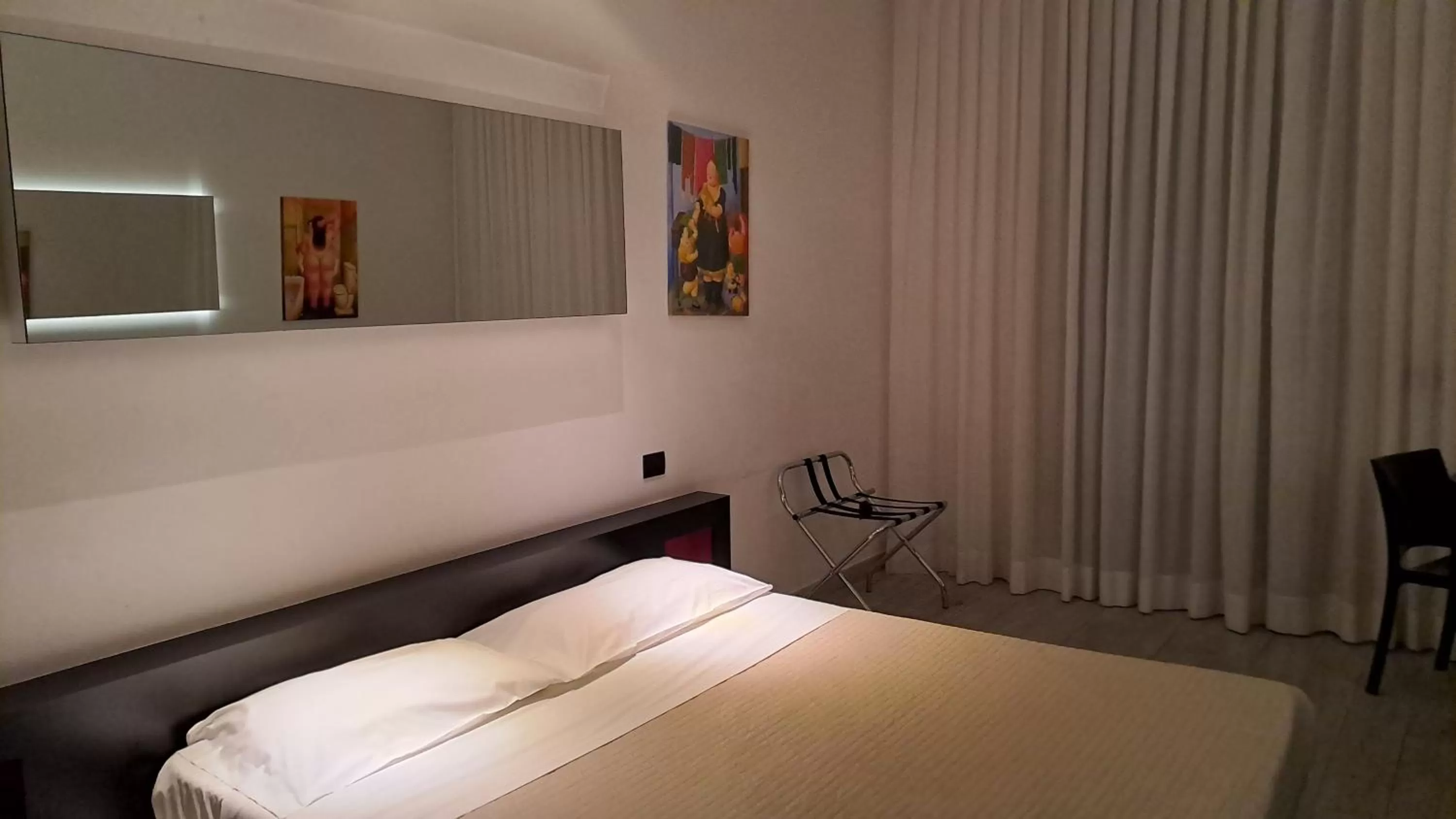 Bed in Blue Shades Hotel