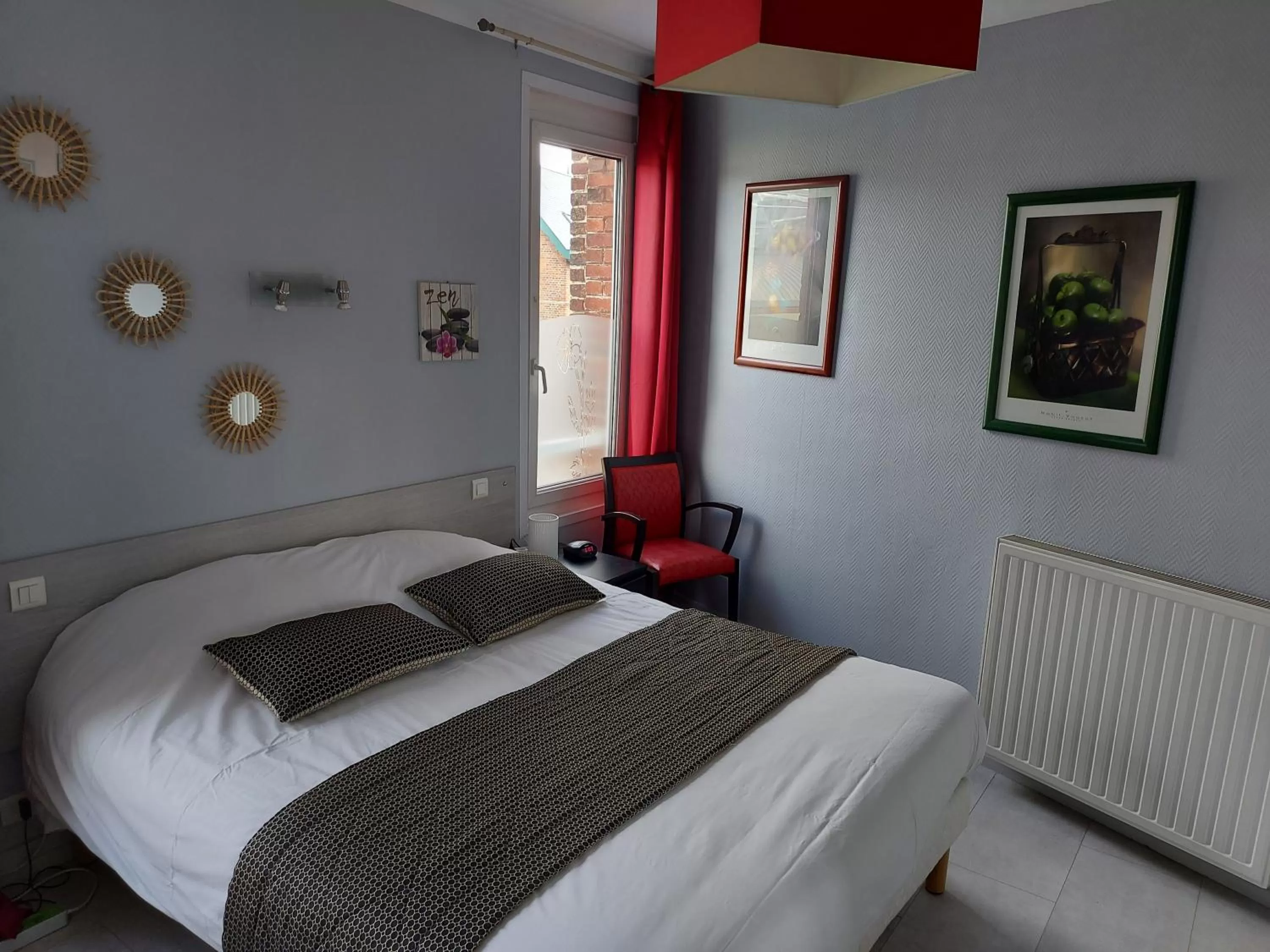 Bed in Hotel De La Paix