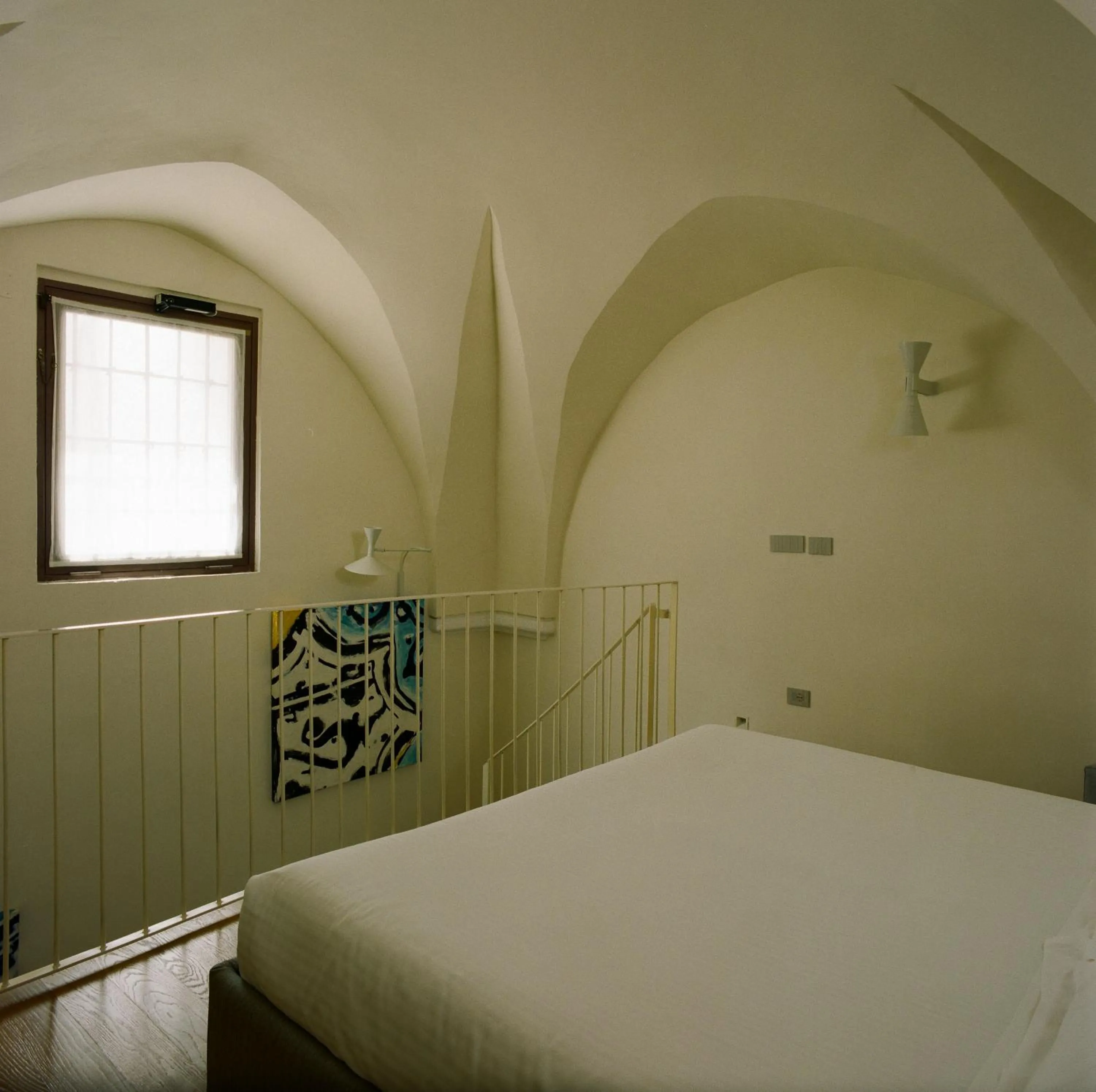 Bed in La Sommità Relais & Chateaux