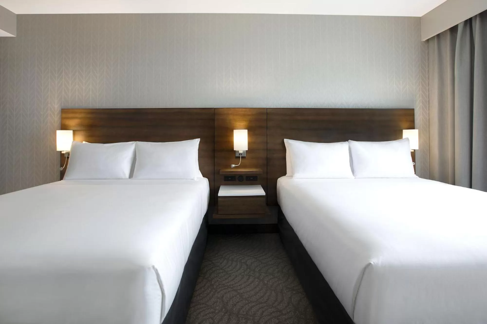 Bed in Great Blue Heron Hotel