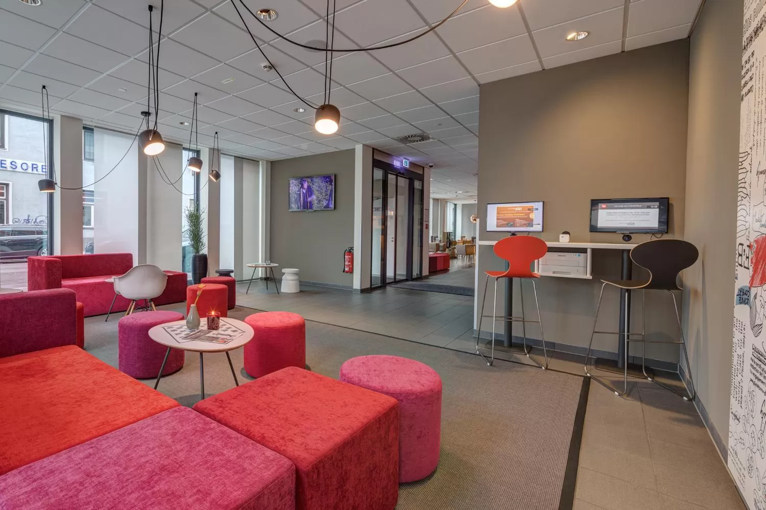 Communal lounge/ TV room in ibis München City Süd