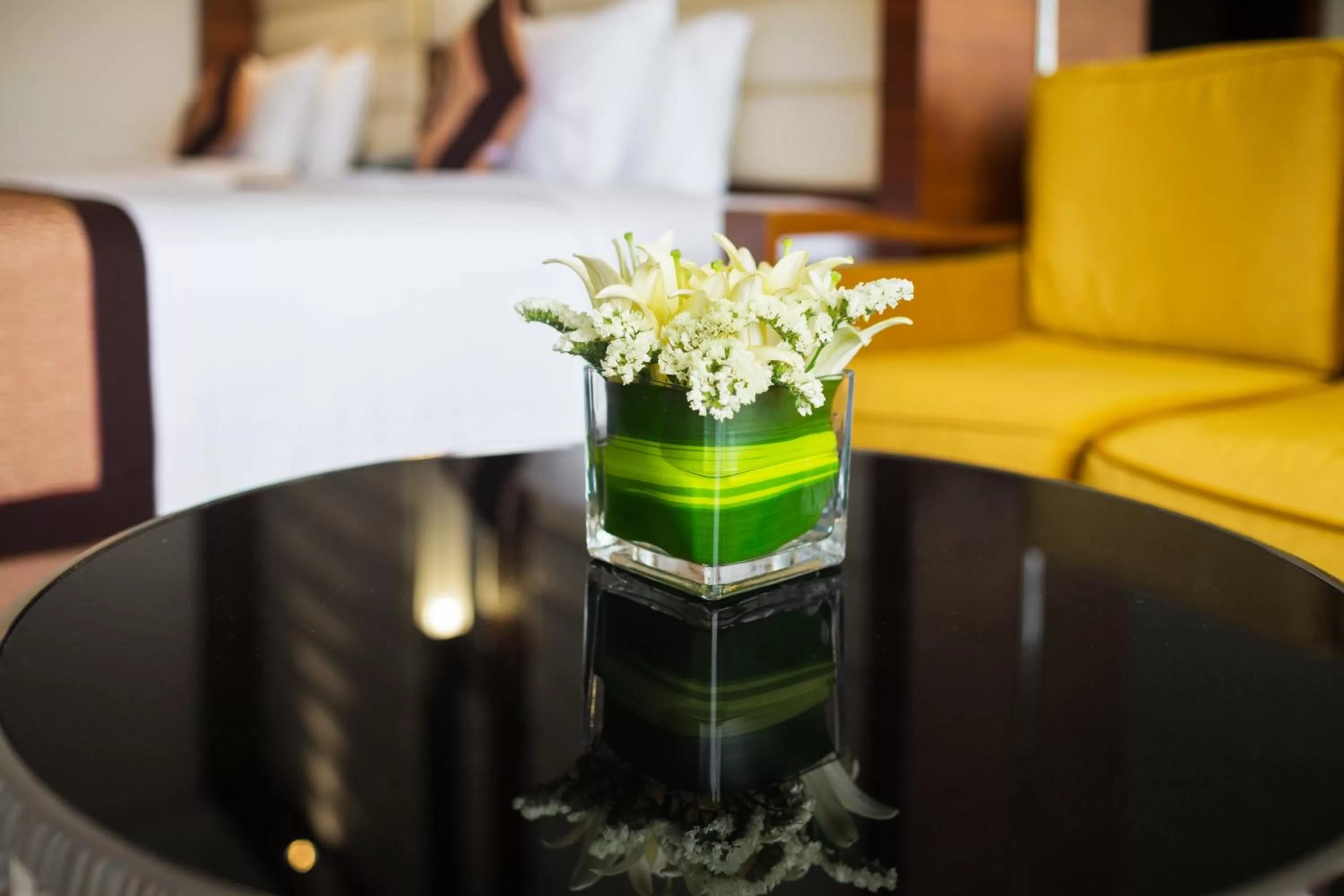 Seating area, Bed in Royal Halong Hotel