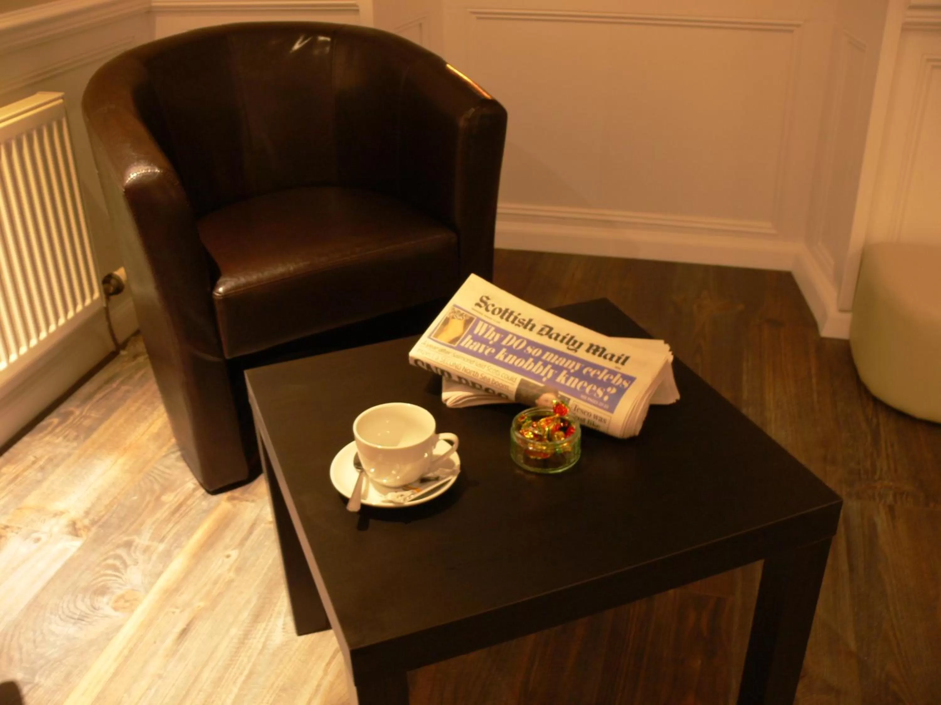 Living room in The Home Arms Guesthouse