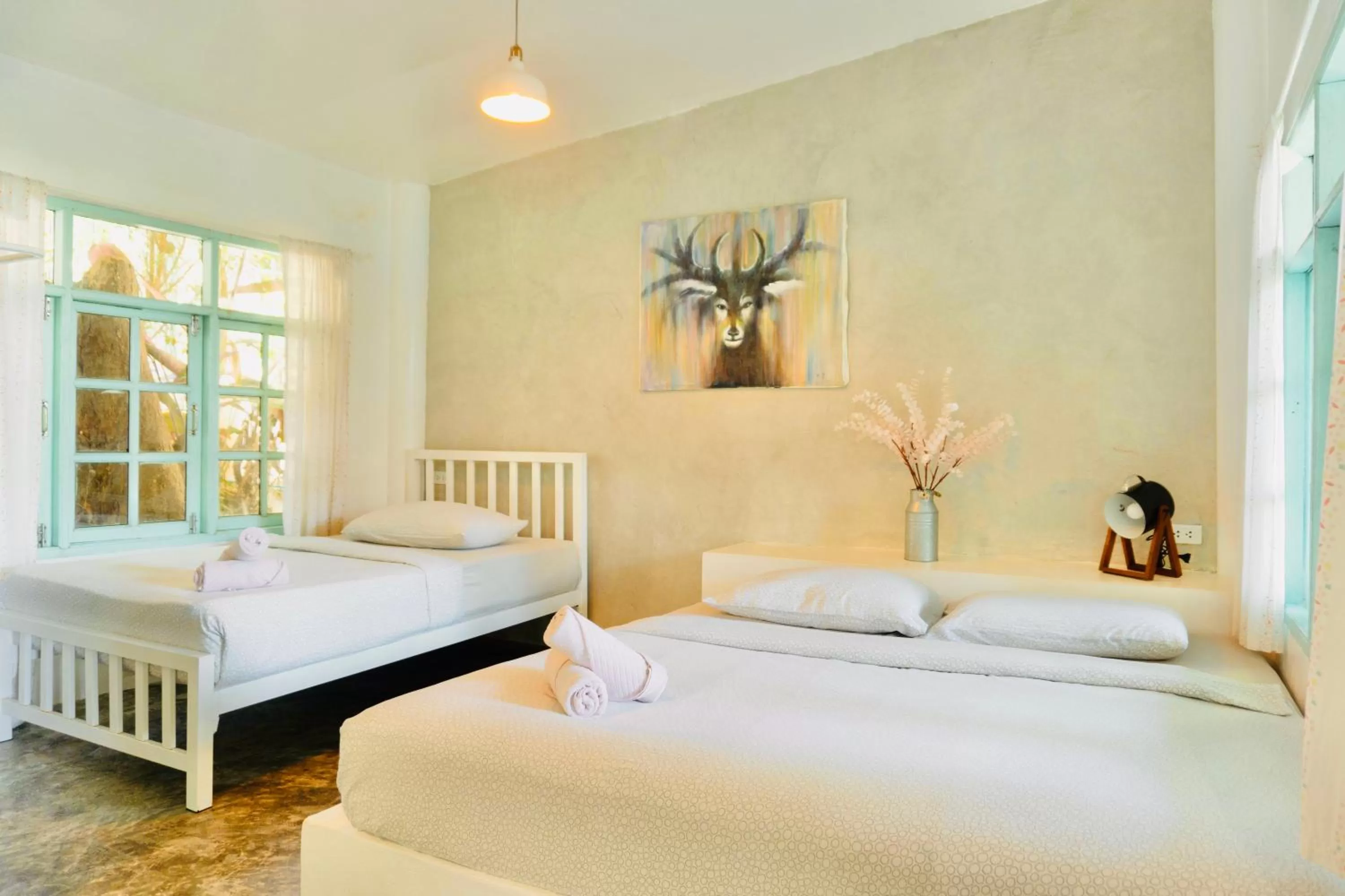 Bed in Indie Beach Bungalows