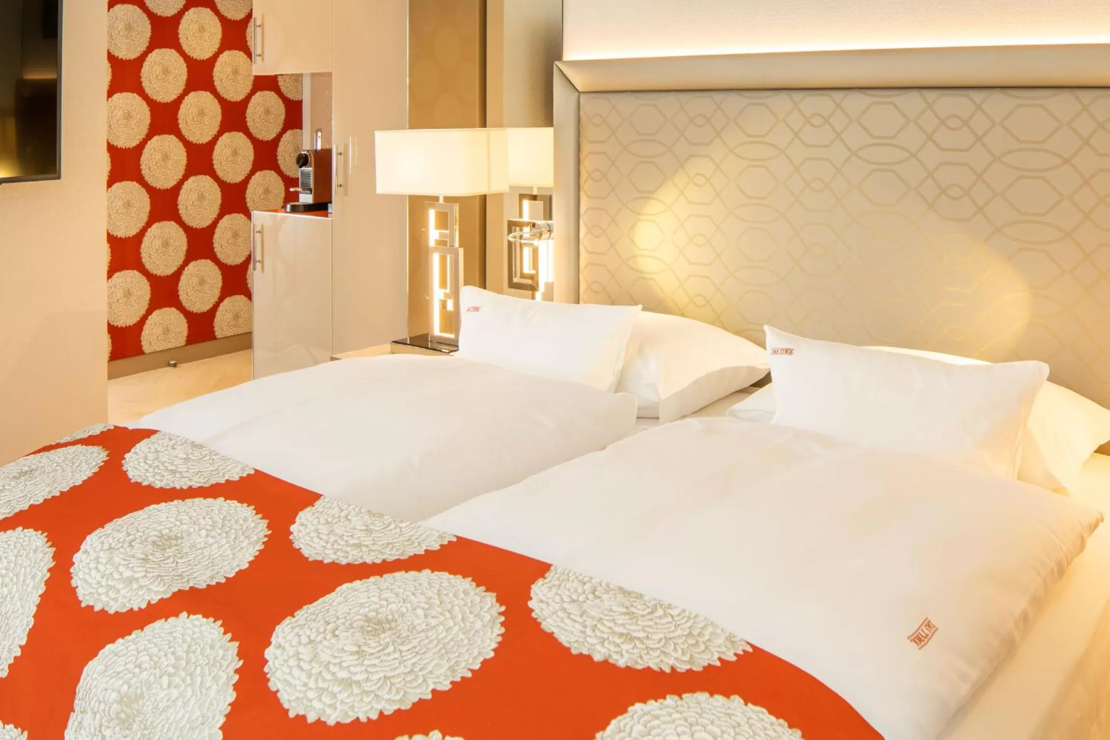 Bed in Boutiquehotel Das Tyrol