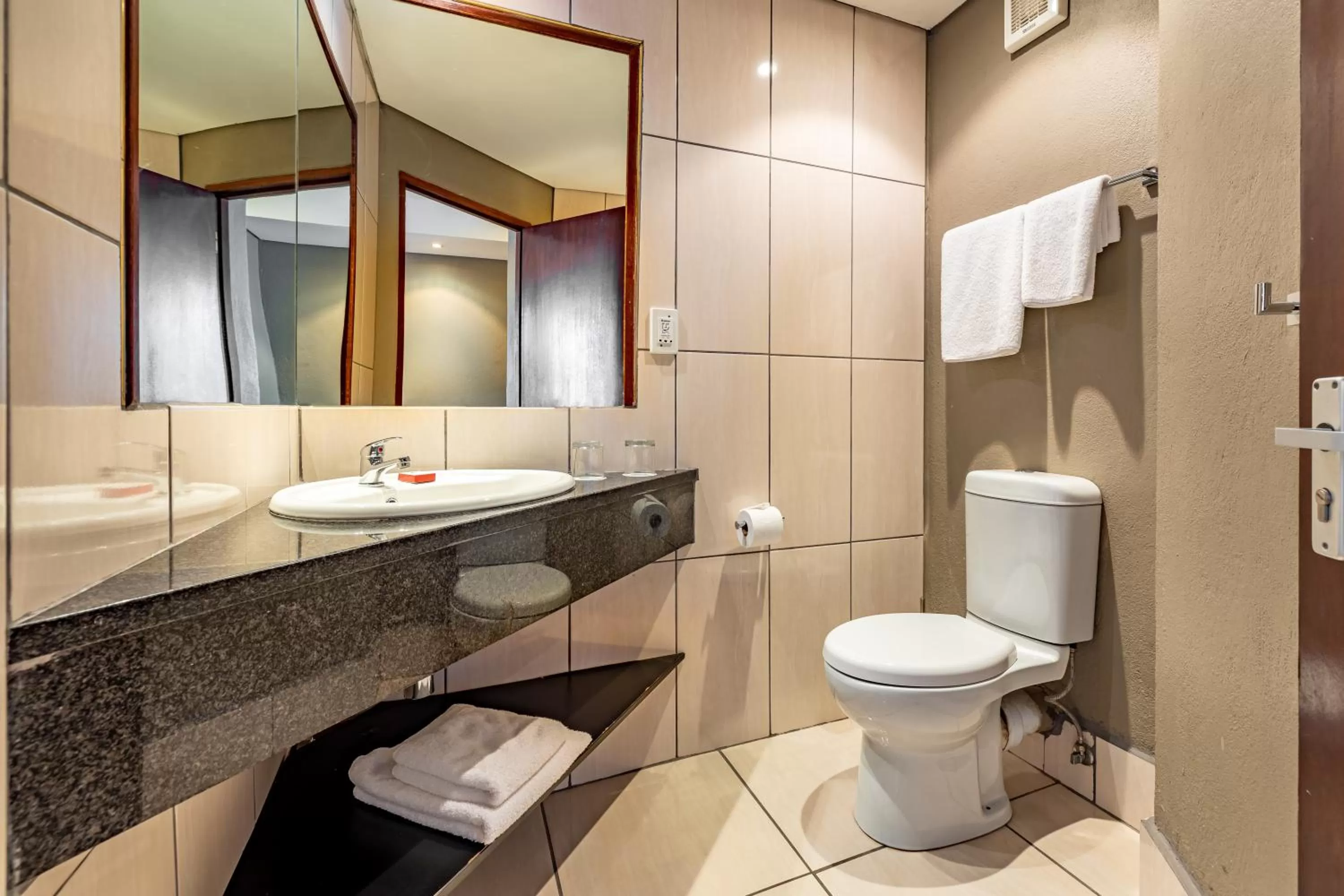 Bathroom in African Sky Hotels - Pine Lake Inn