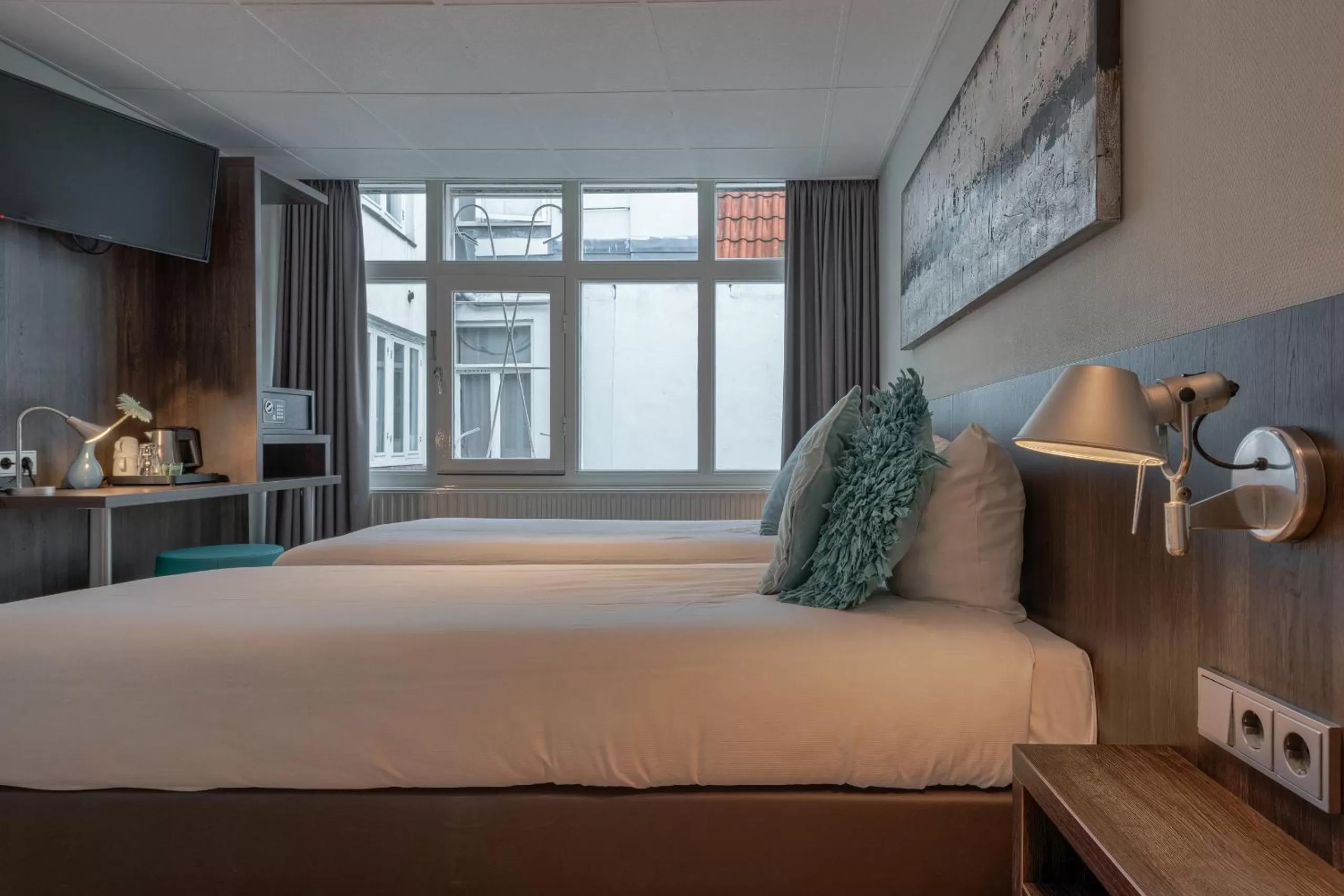 Bed in Hotel Damsquare