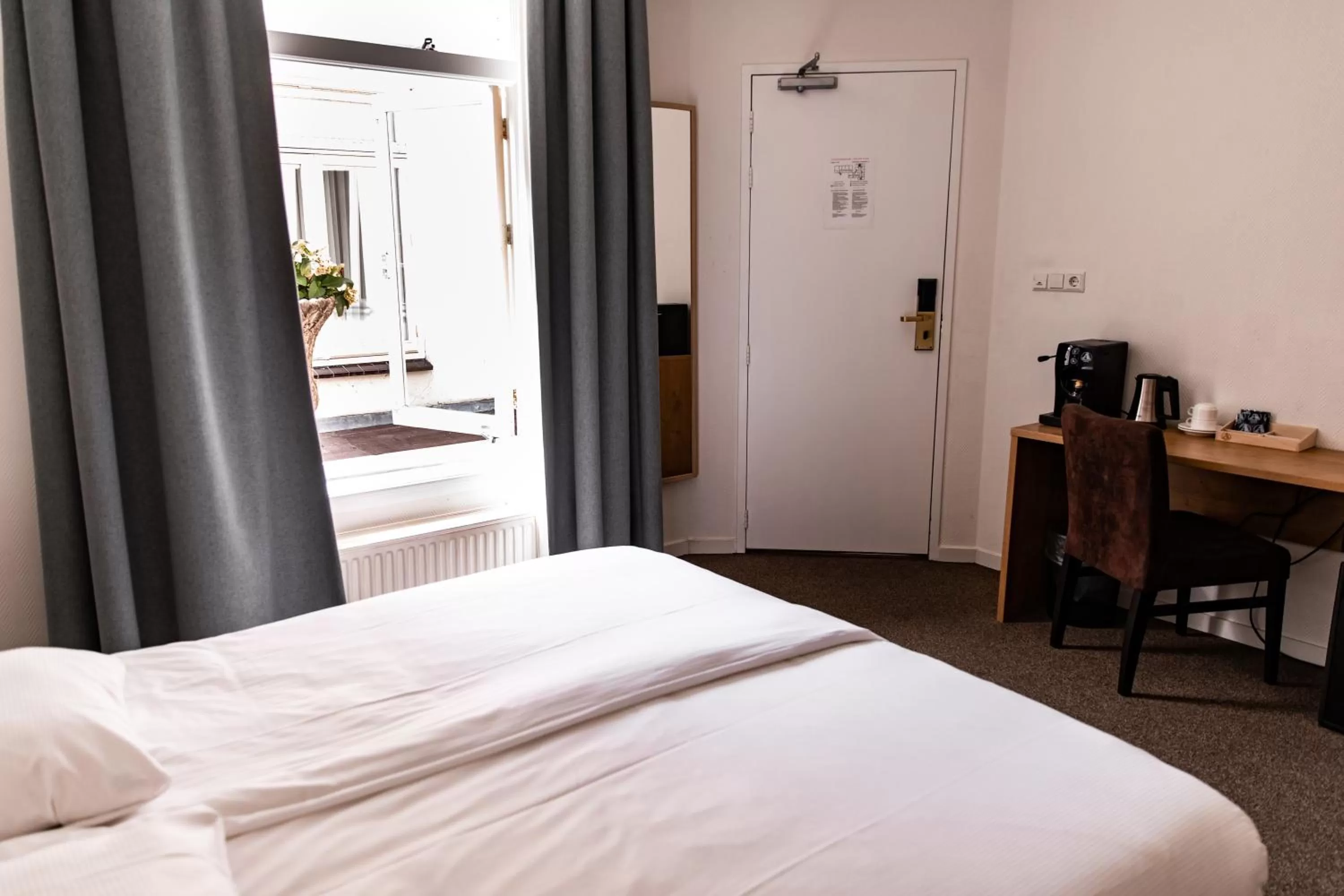 Nearby landmark, Bed in Ambassador City Centre Hotel