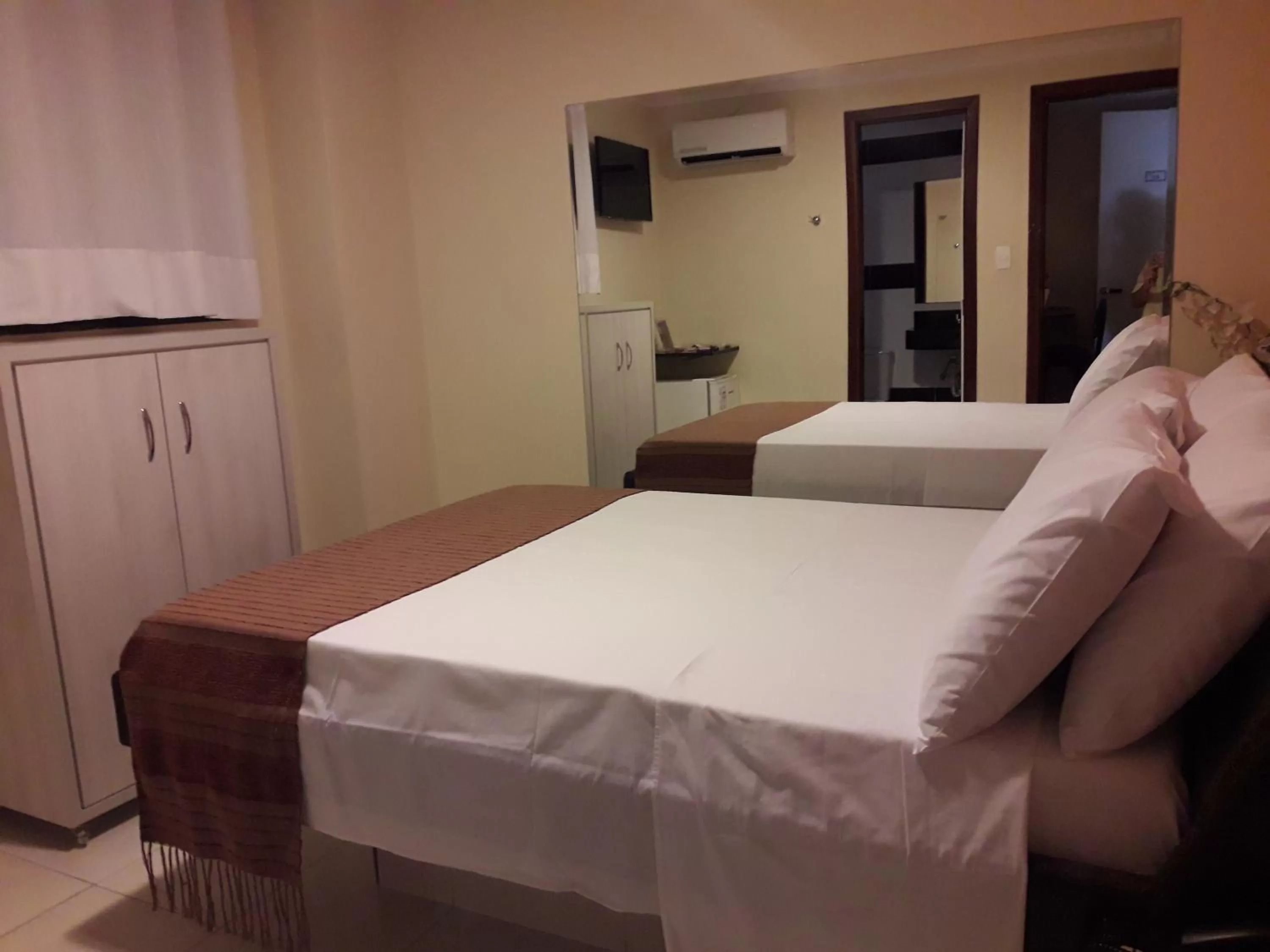 Bed in Hotel Sempre Executive