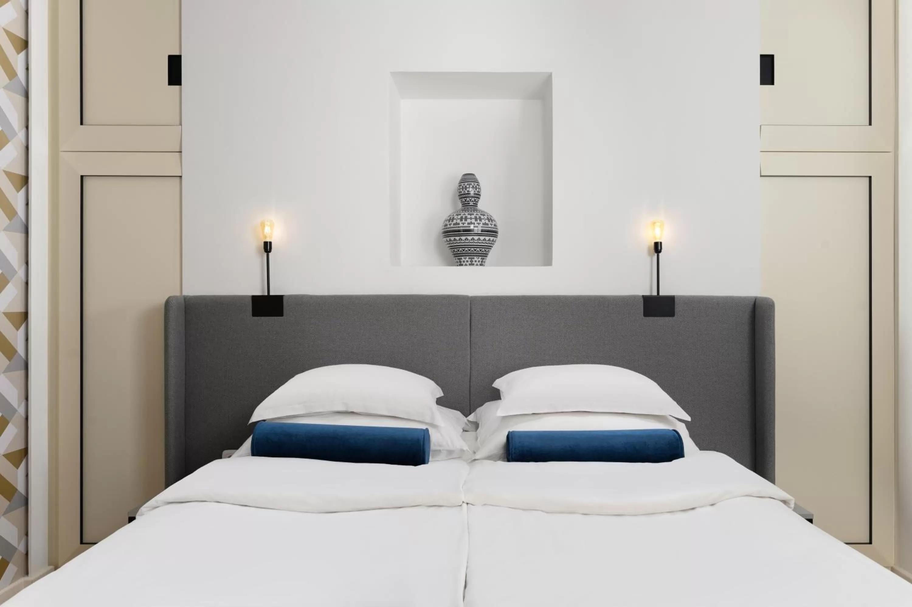 Bed in Maison Bistro & Hotel