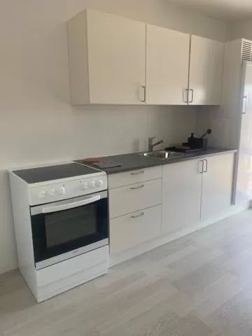 Kitchen or kitchenette in Just-Sleep