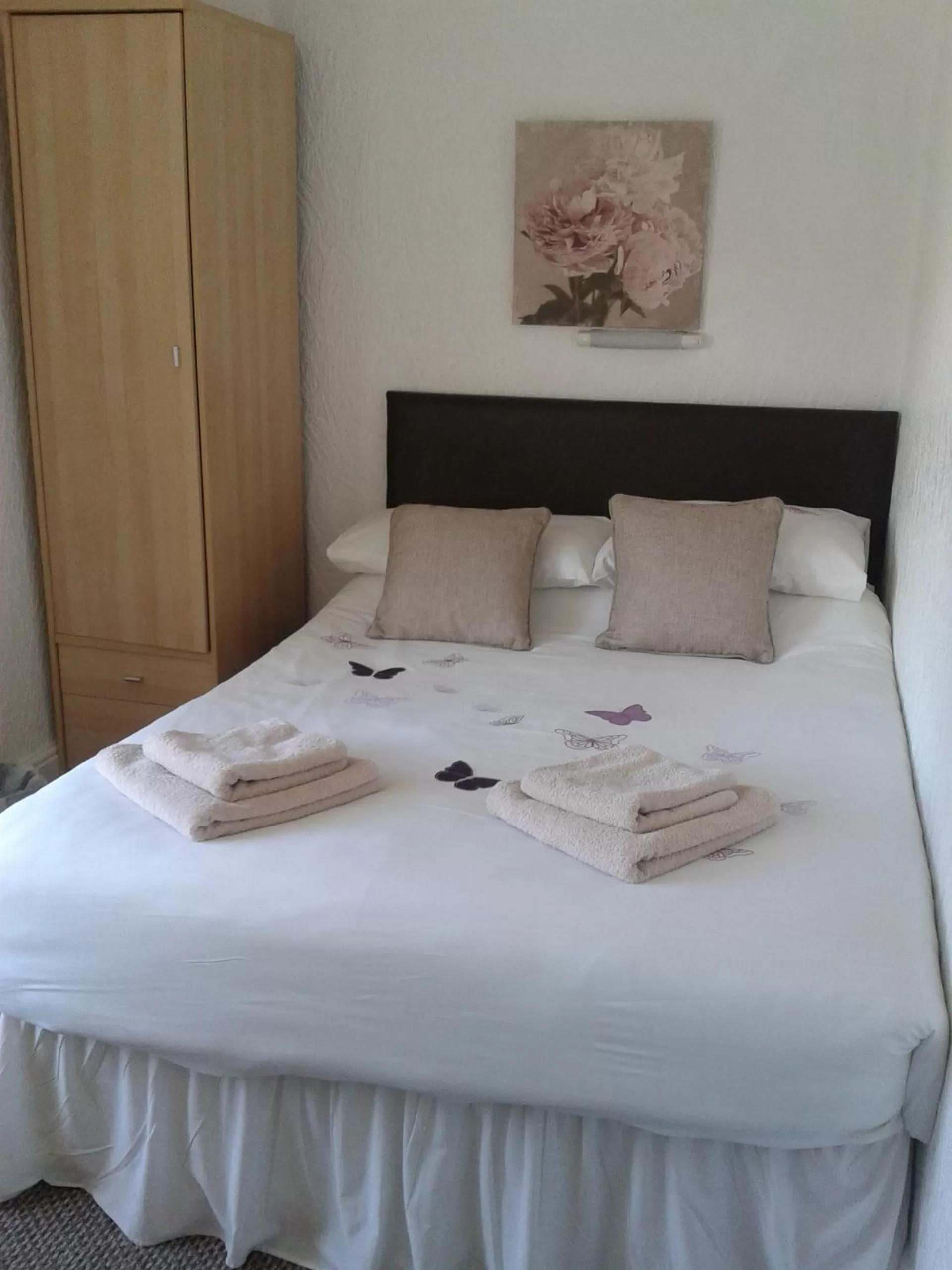 Bed in Legends Hotel