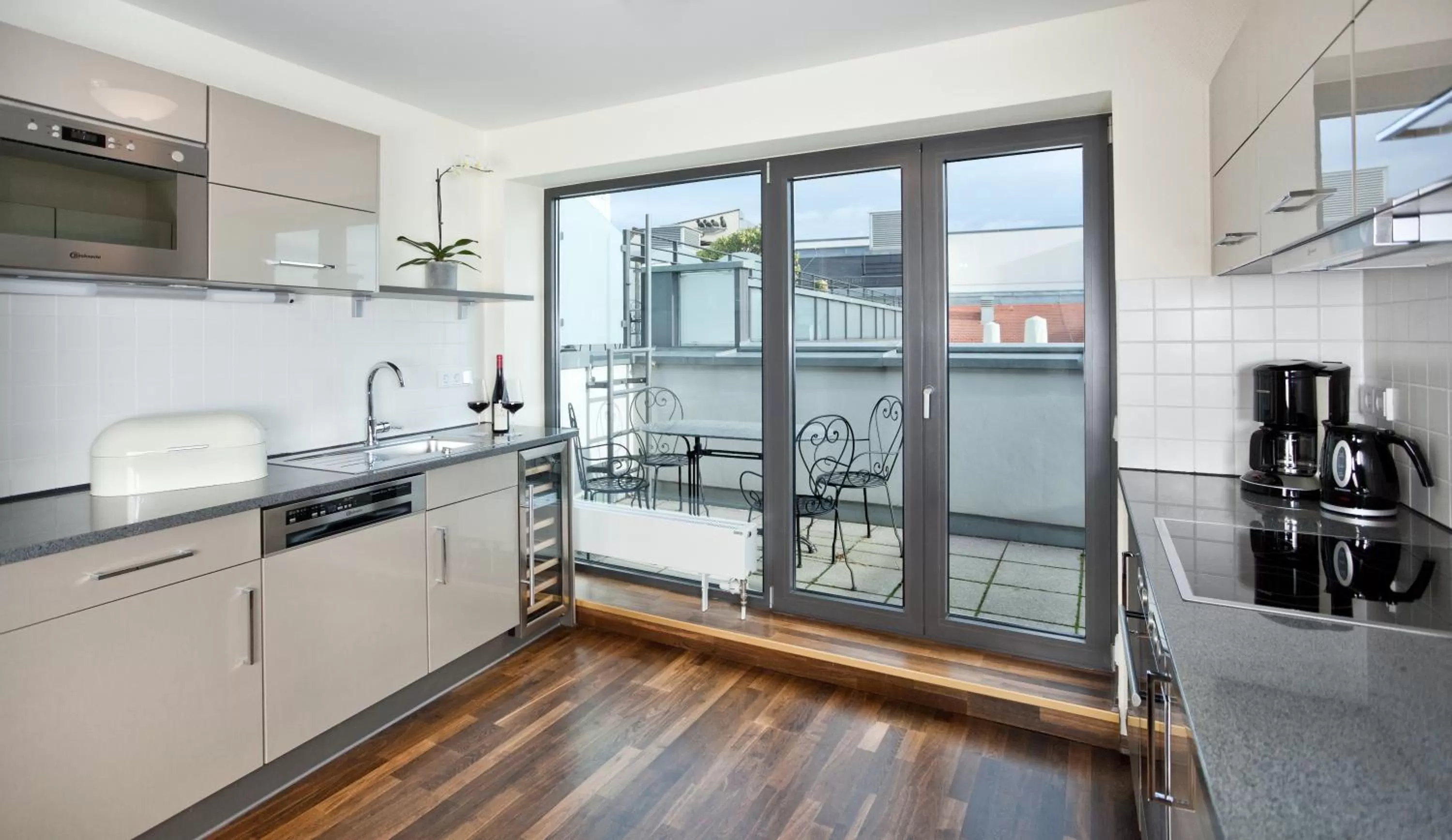 Kitchen or kitchenette in Hotel Suitess