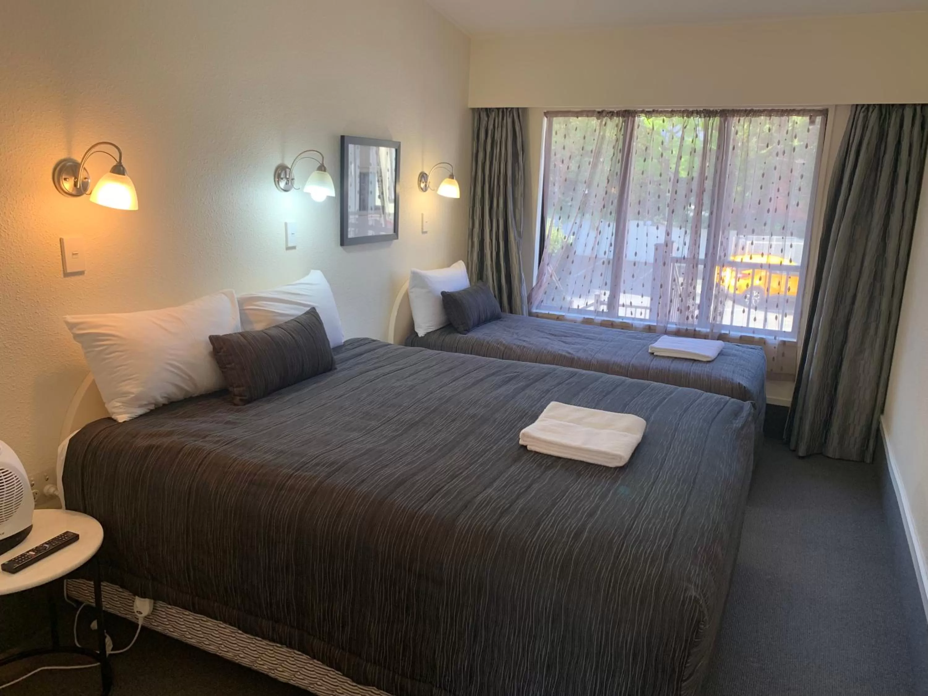 Bed in 755 Regal Court Motel