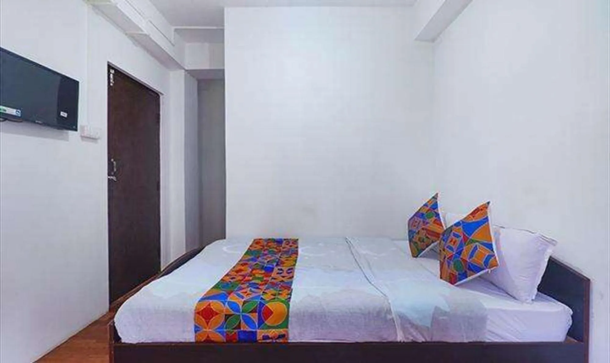 Bed in FabExpress Laxmi Niwas