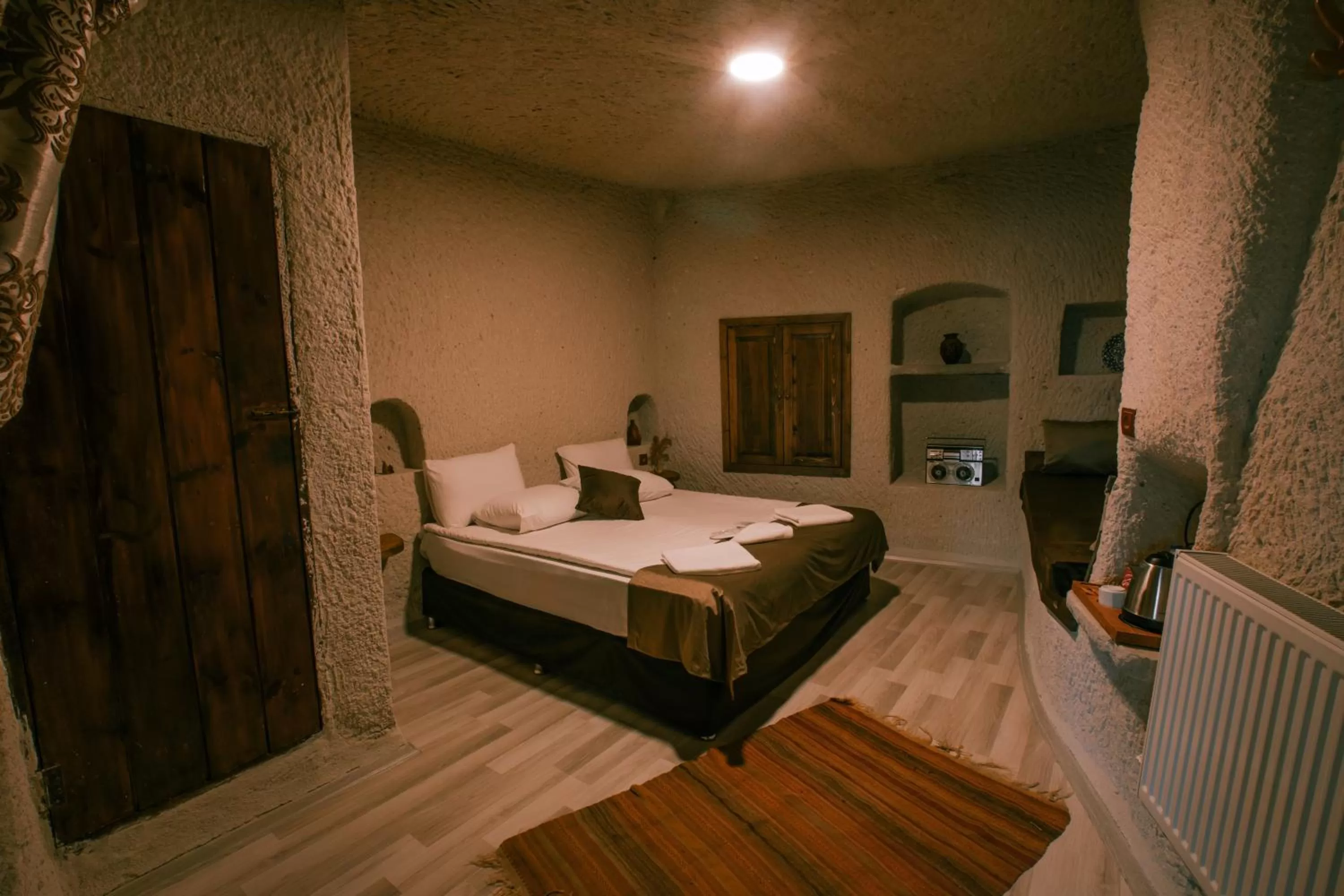 Photo of the whole room, Bed in Mia Cappadocia Cave Hotel