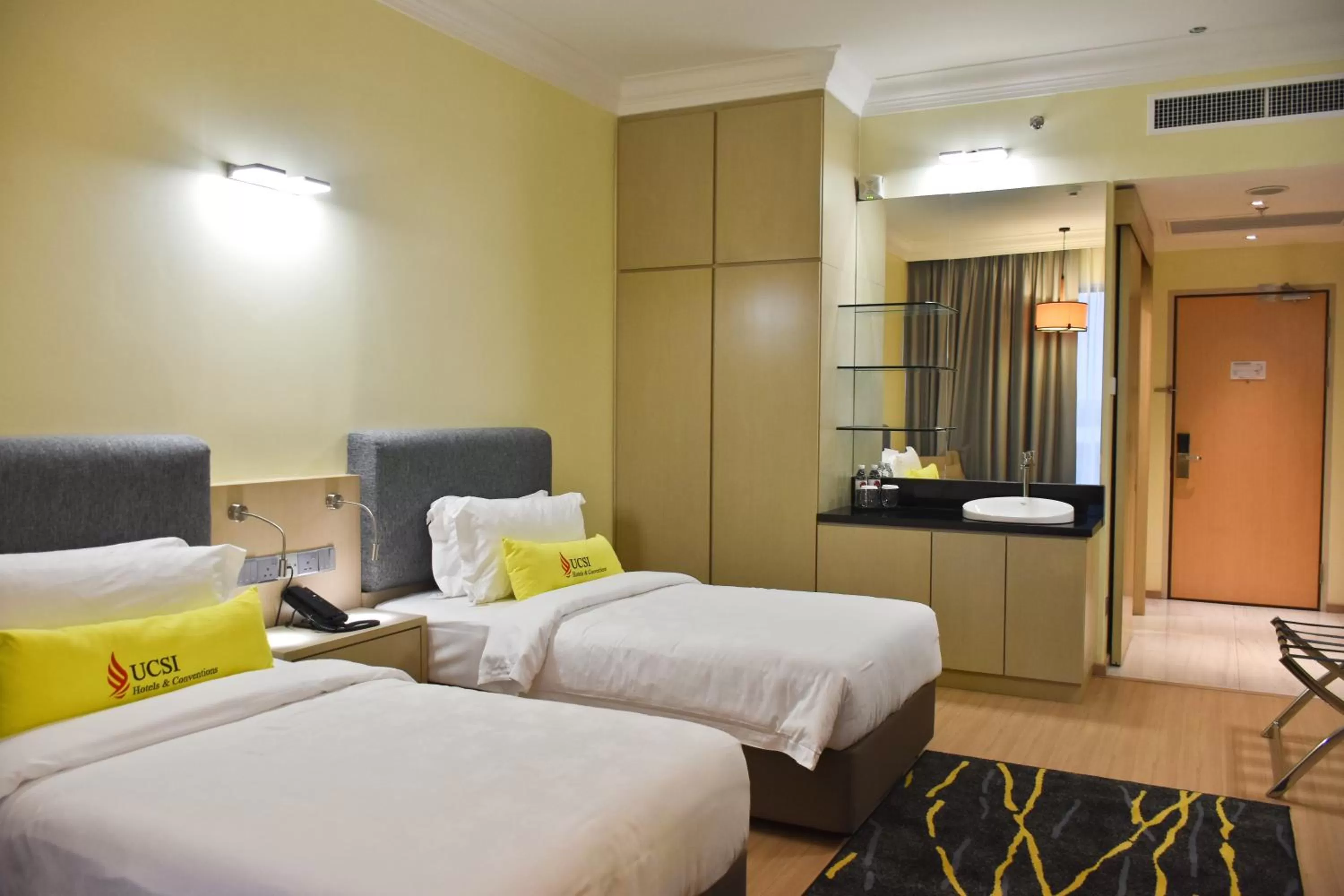 Photo of the whole room, Bed in UCSI Hotel Kuching