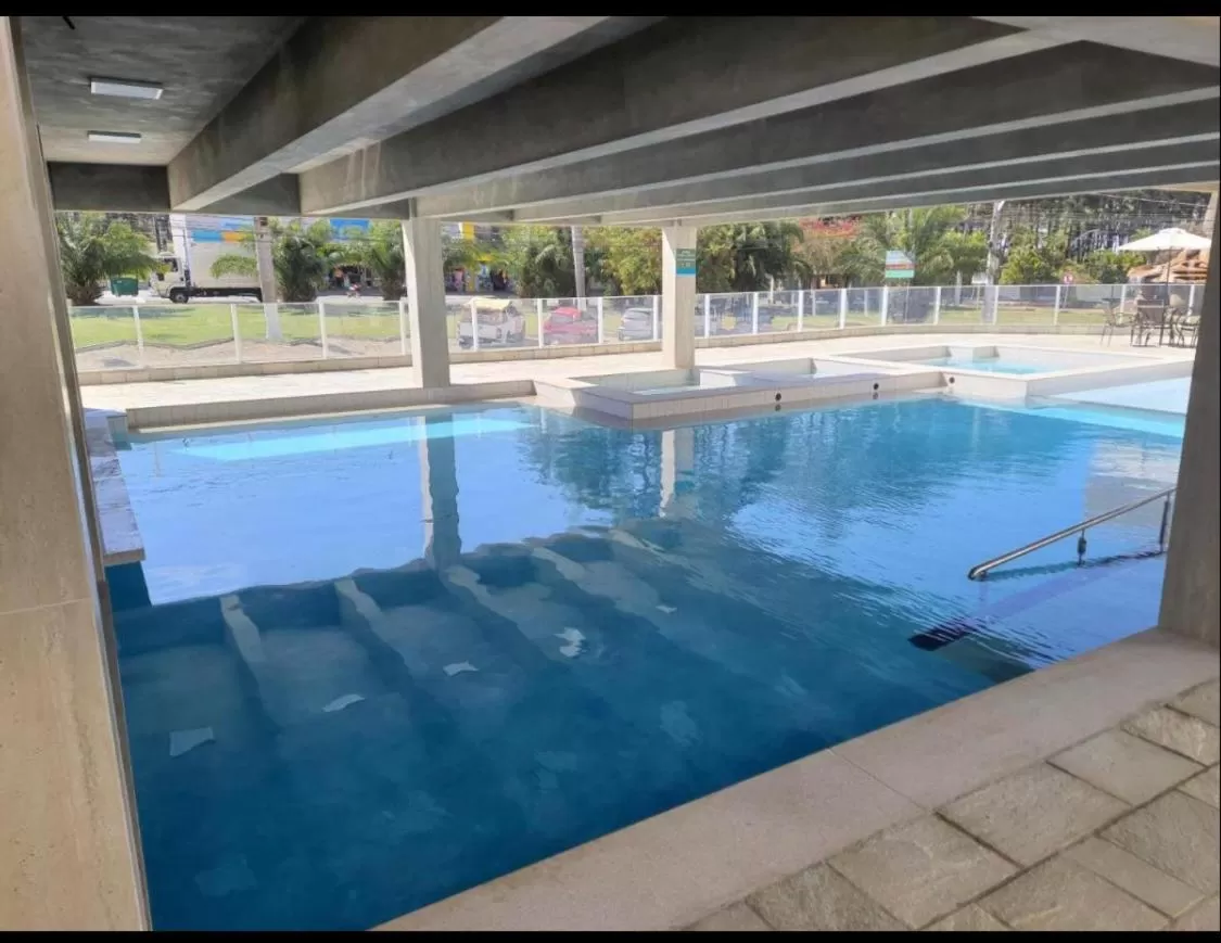 Swimming pool in SPAZZIO DI ROMA INCLUSO ACQUA PARK SPLASH