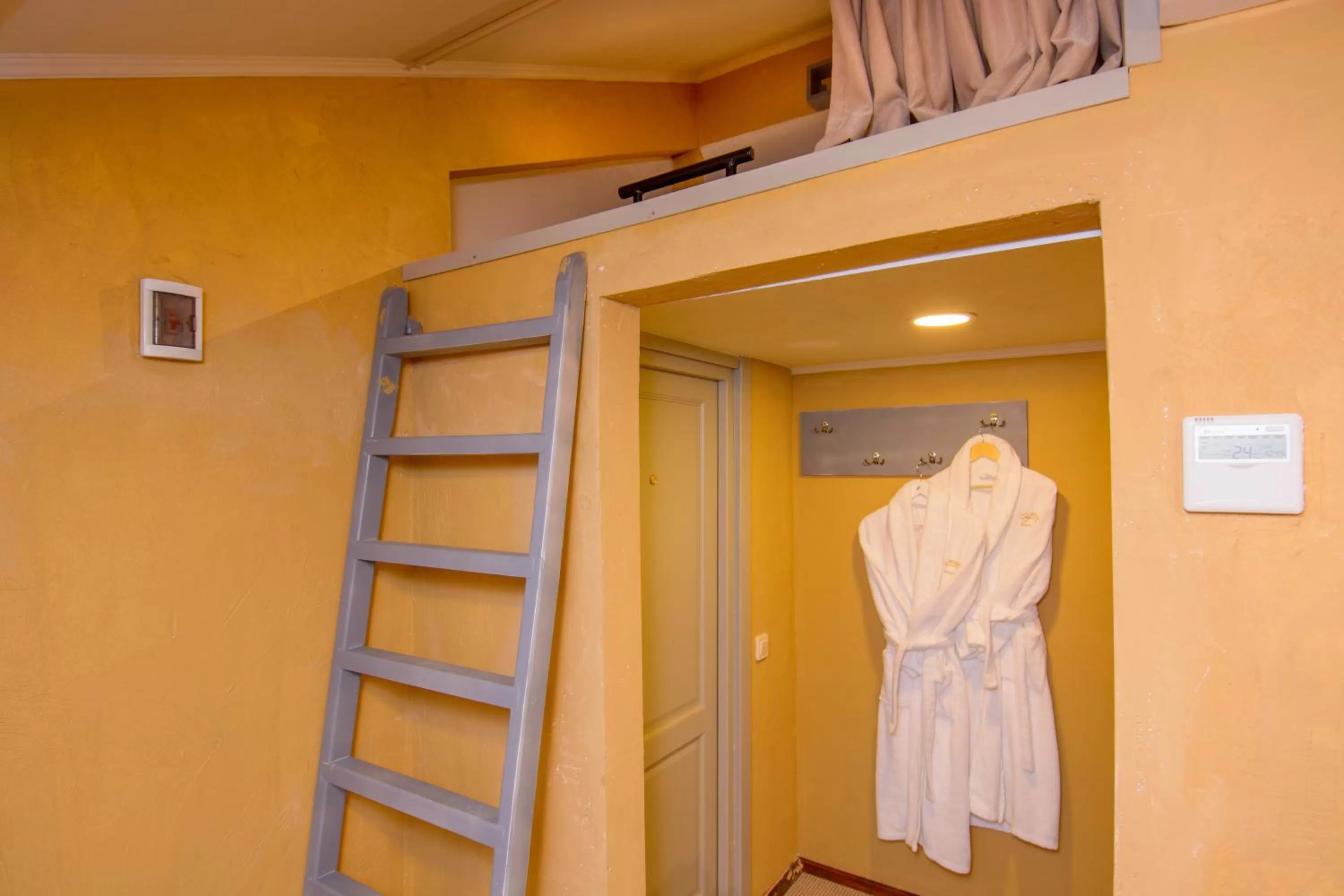 Bed in Kindli Boutique Hotel