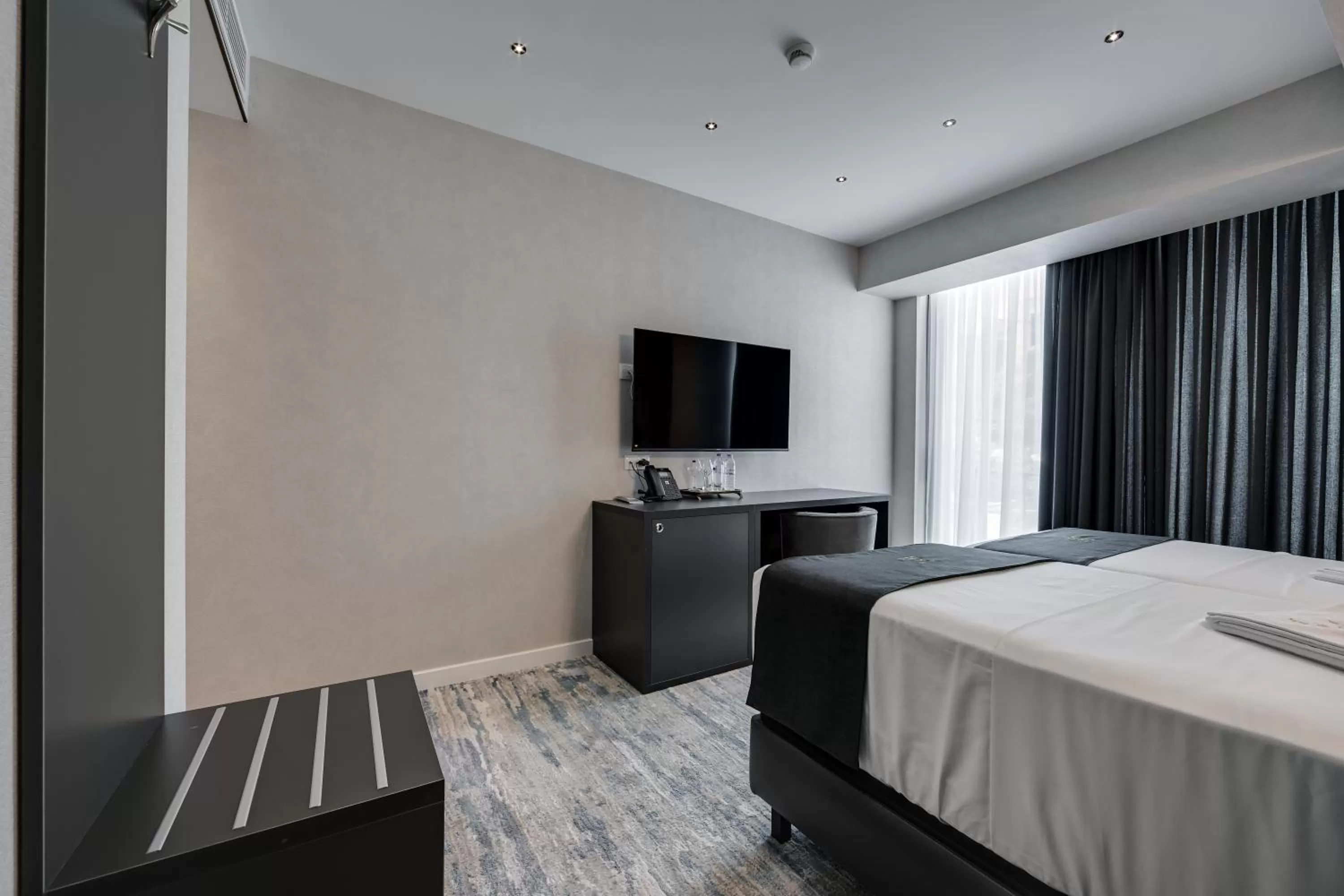 Photo of the whole room, TV/Entertainment Center in Mit Hotel Tbilisi