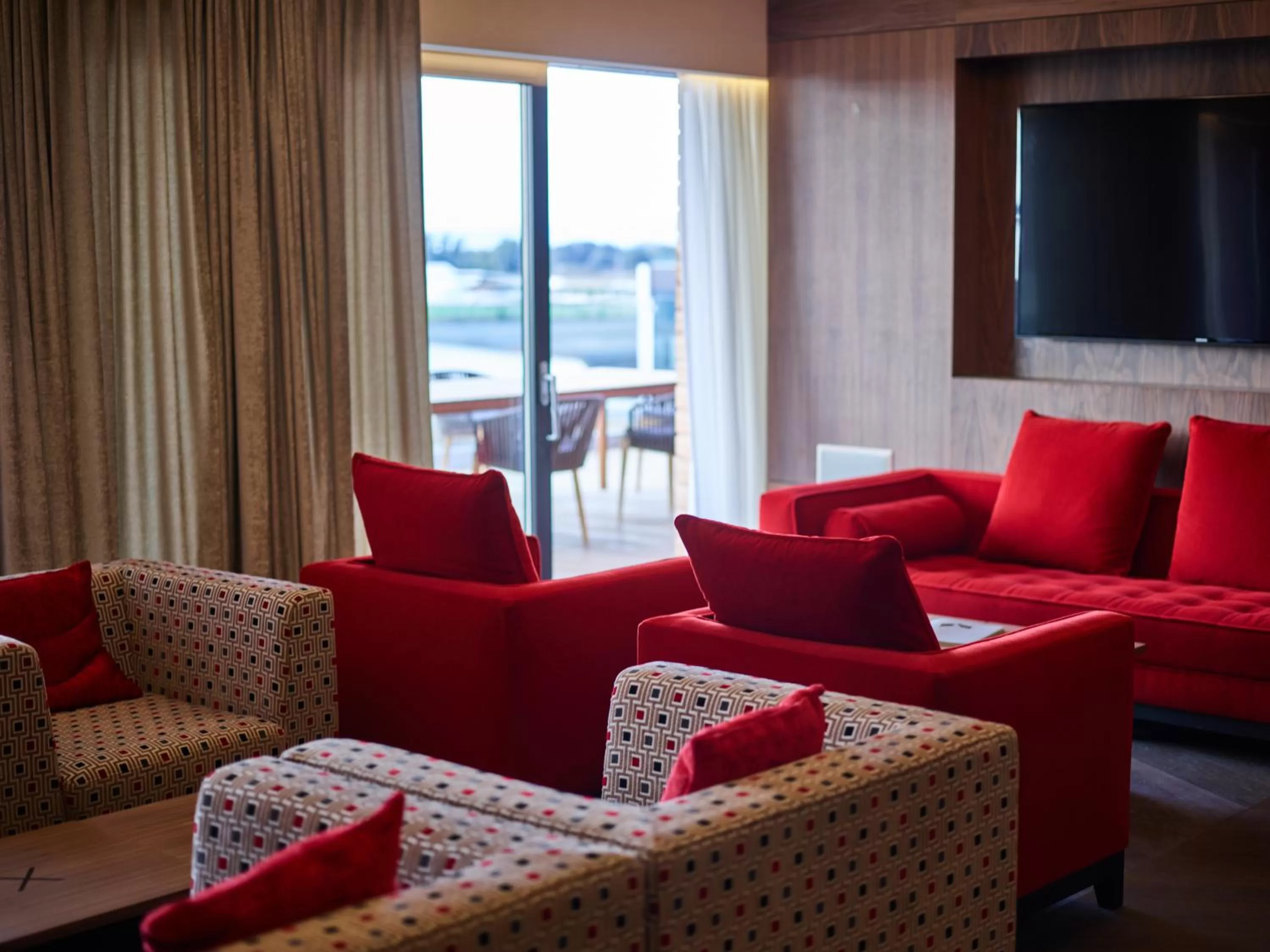 Communal lounge/ TV room in X-BIONIC Hotel