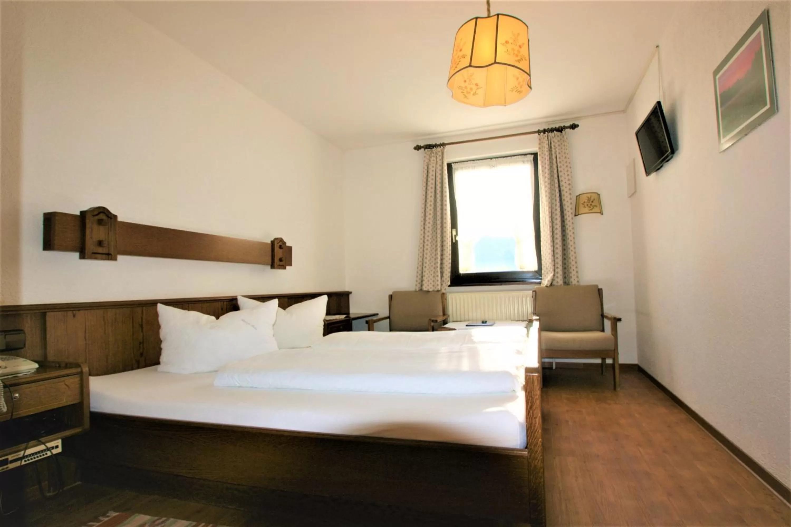 Photo of the whole room, Bed in ZUR TRAUBE Schwarzwaldhotel & Restaurant am Titisee