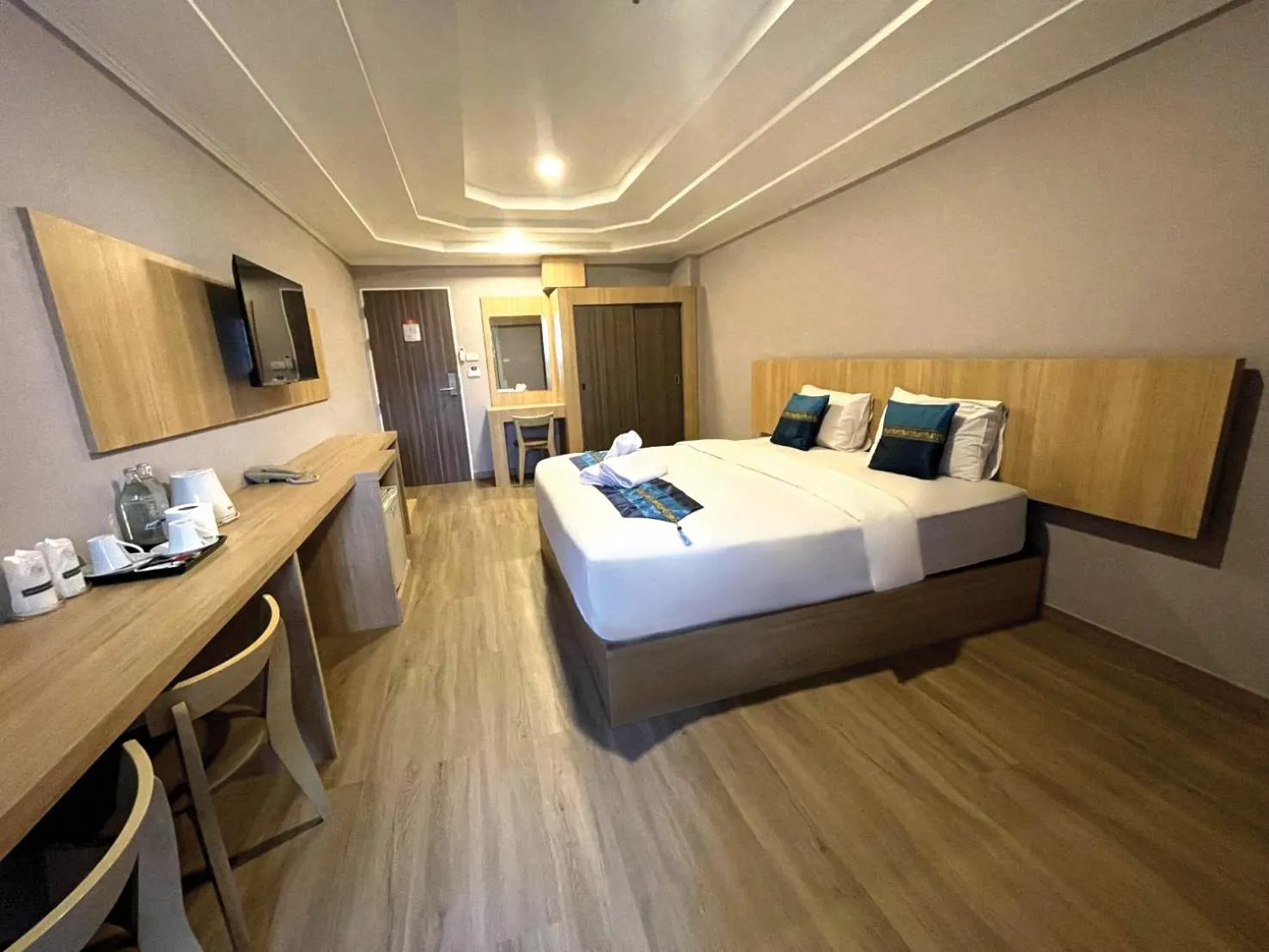 Bed in Grand Tara Garden Thai Hotel