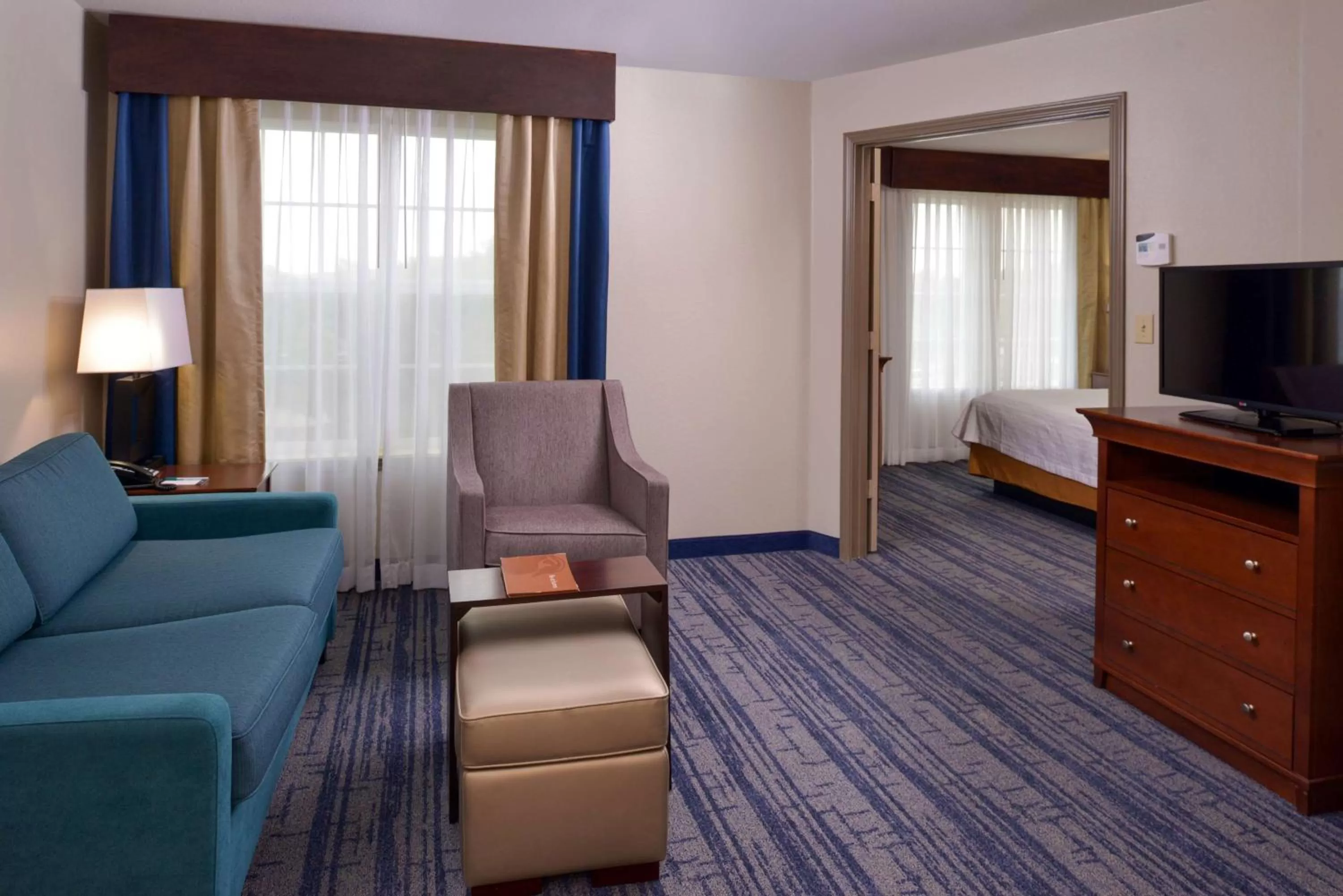 Living room, Bed in Homewood Suites by Hilton Dallas-Lewisville