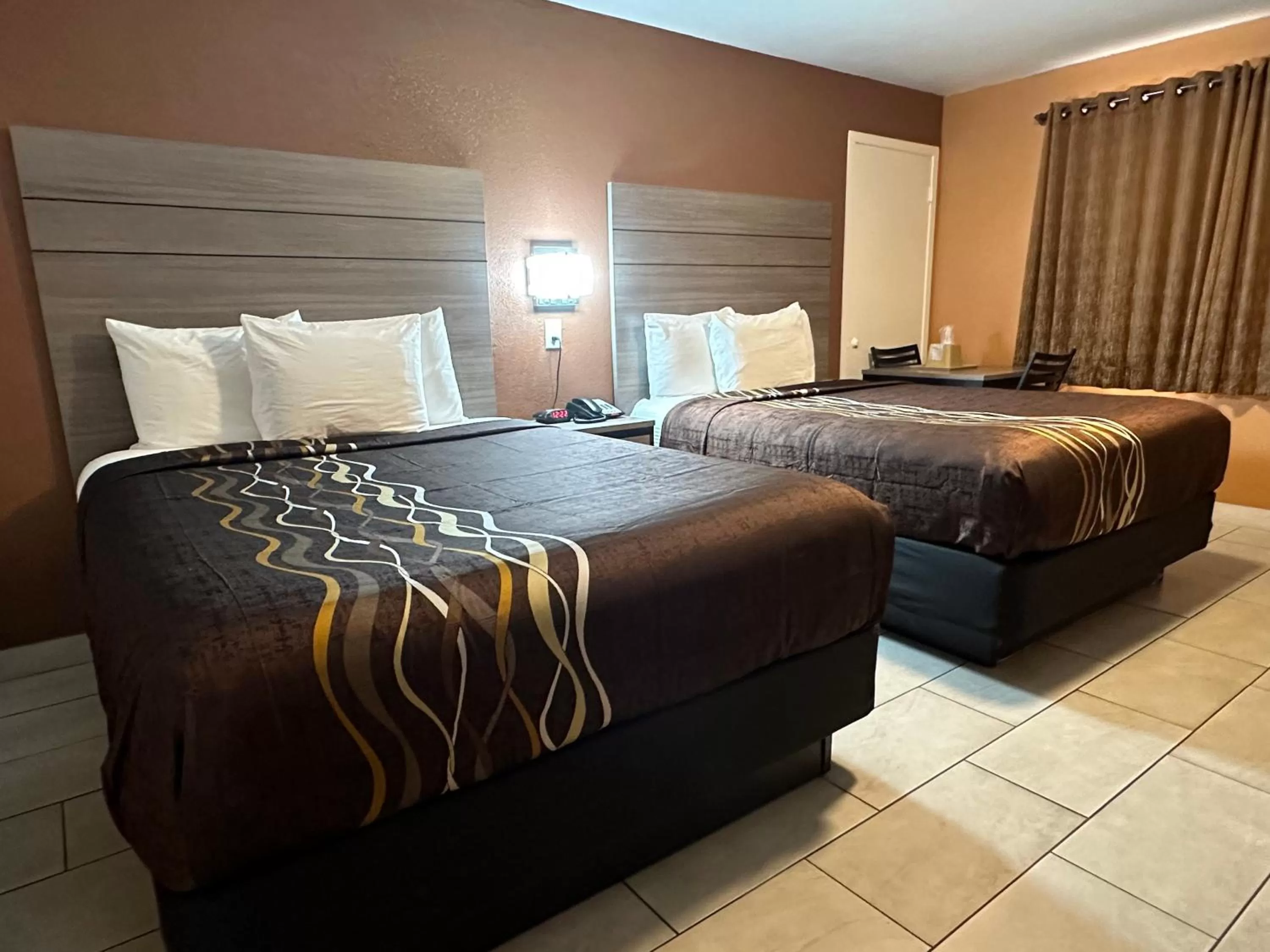 Bed in New Corral Motel