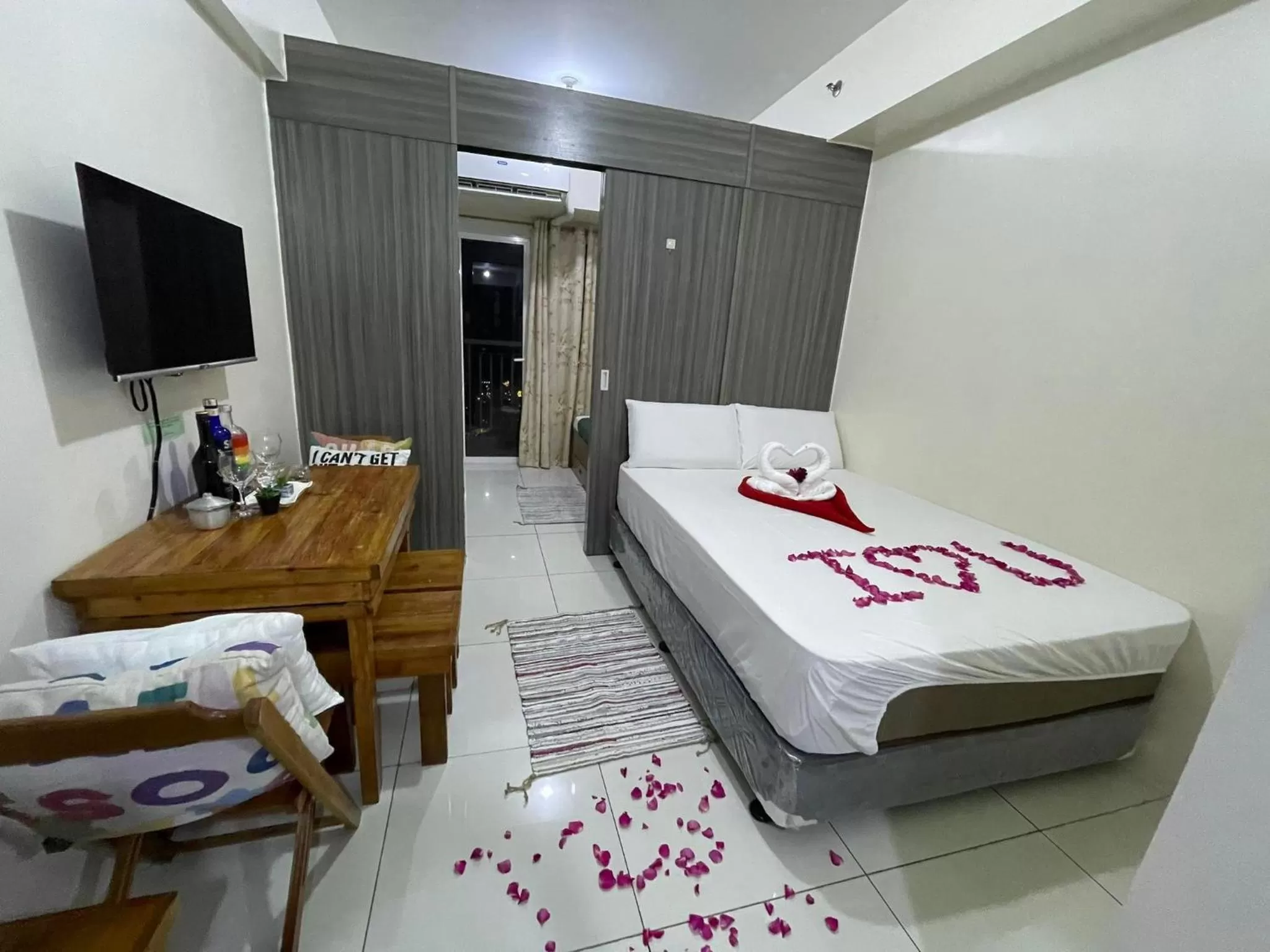 Bed in Green Residences Stays by PBYY