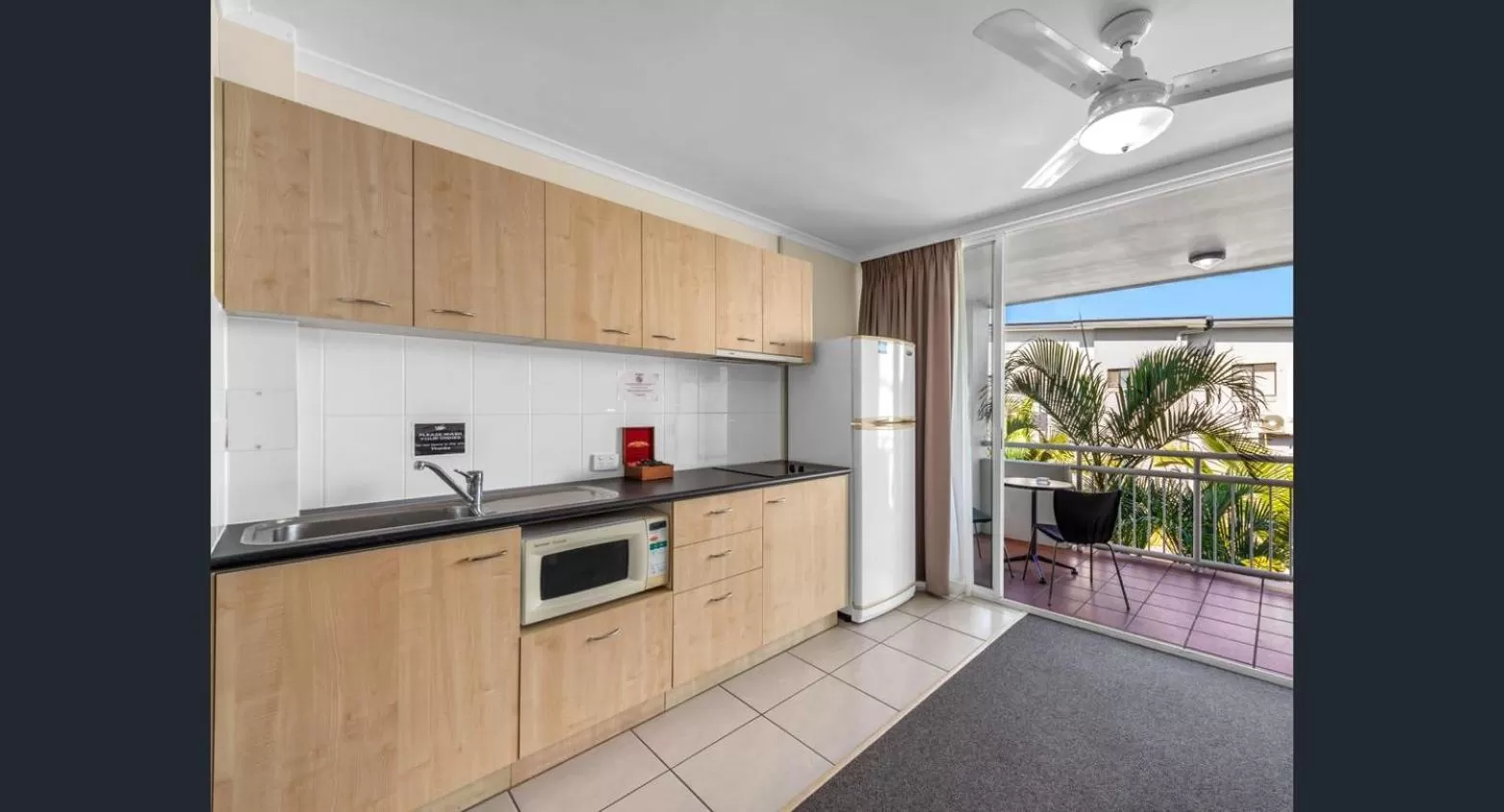 Kitchen or kitchenette in The Wellington Apartment Hotel