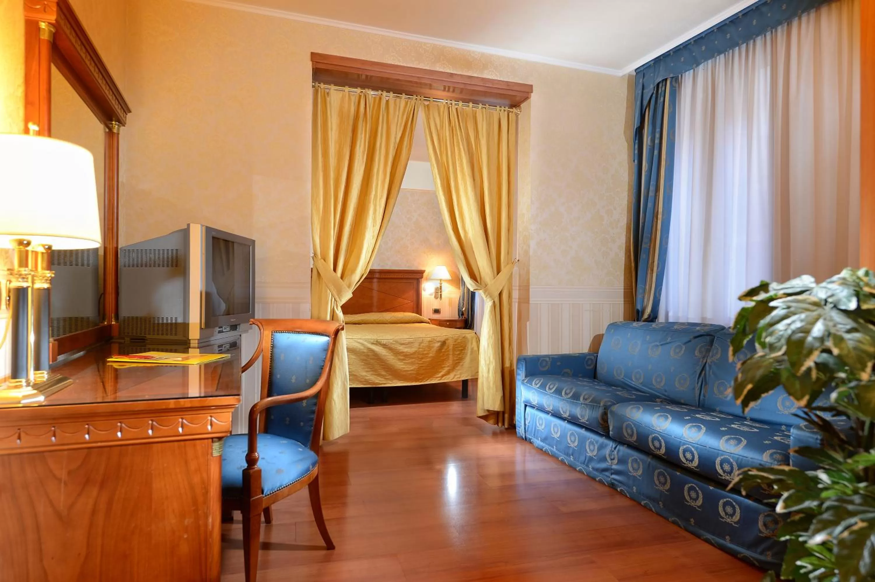 Seating area, Bed in Antico Panada