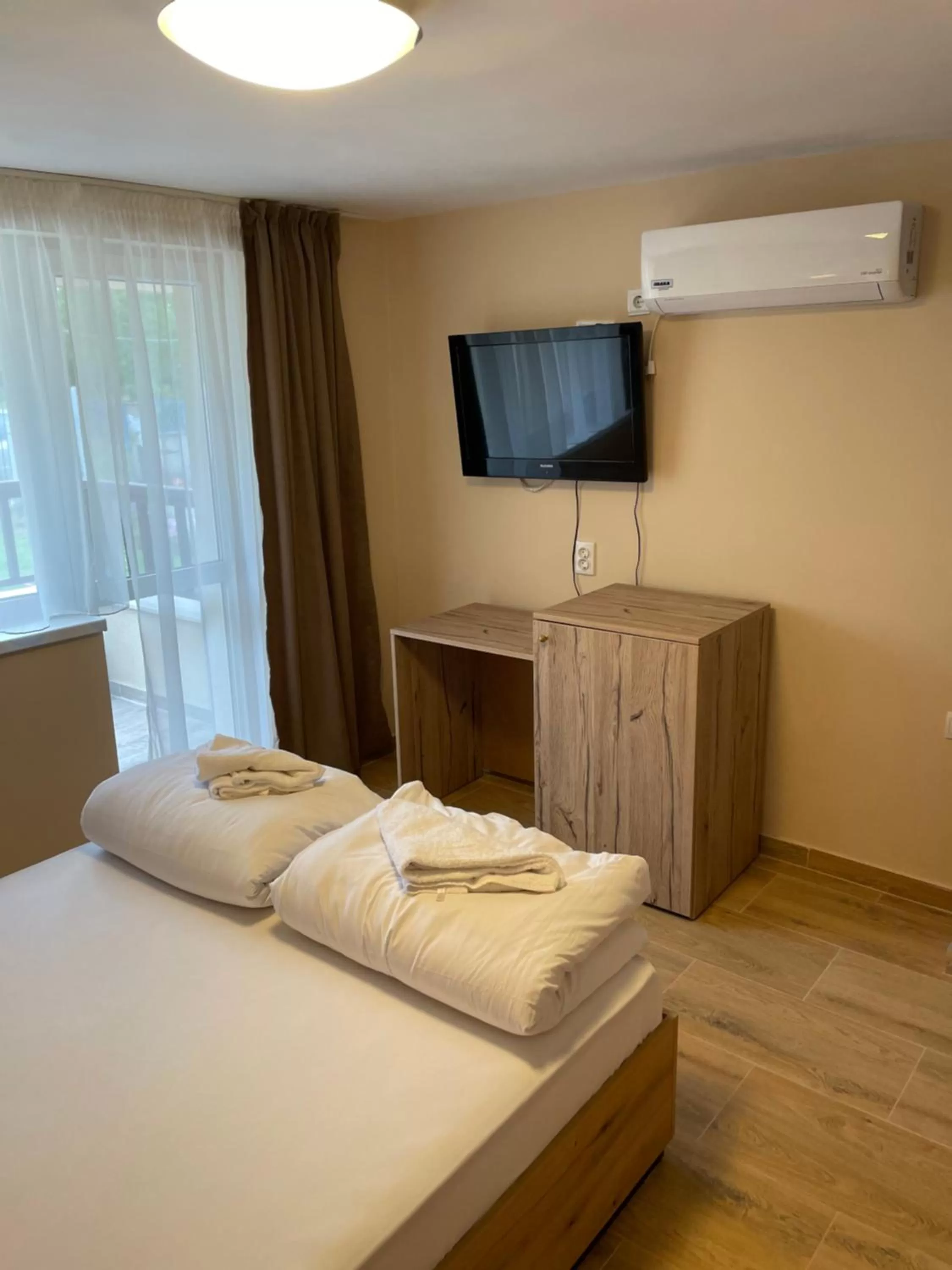 Bed in Family Hotel Malibu