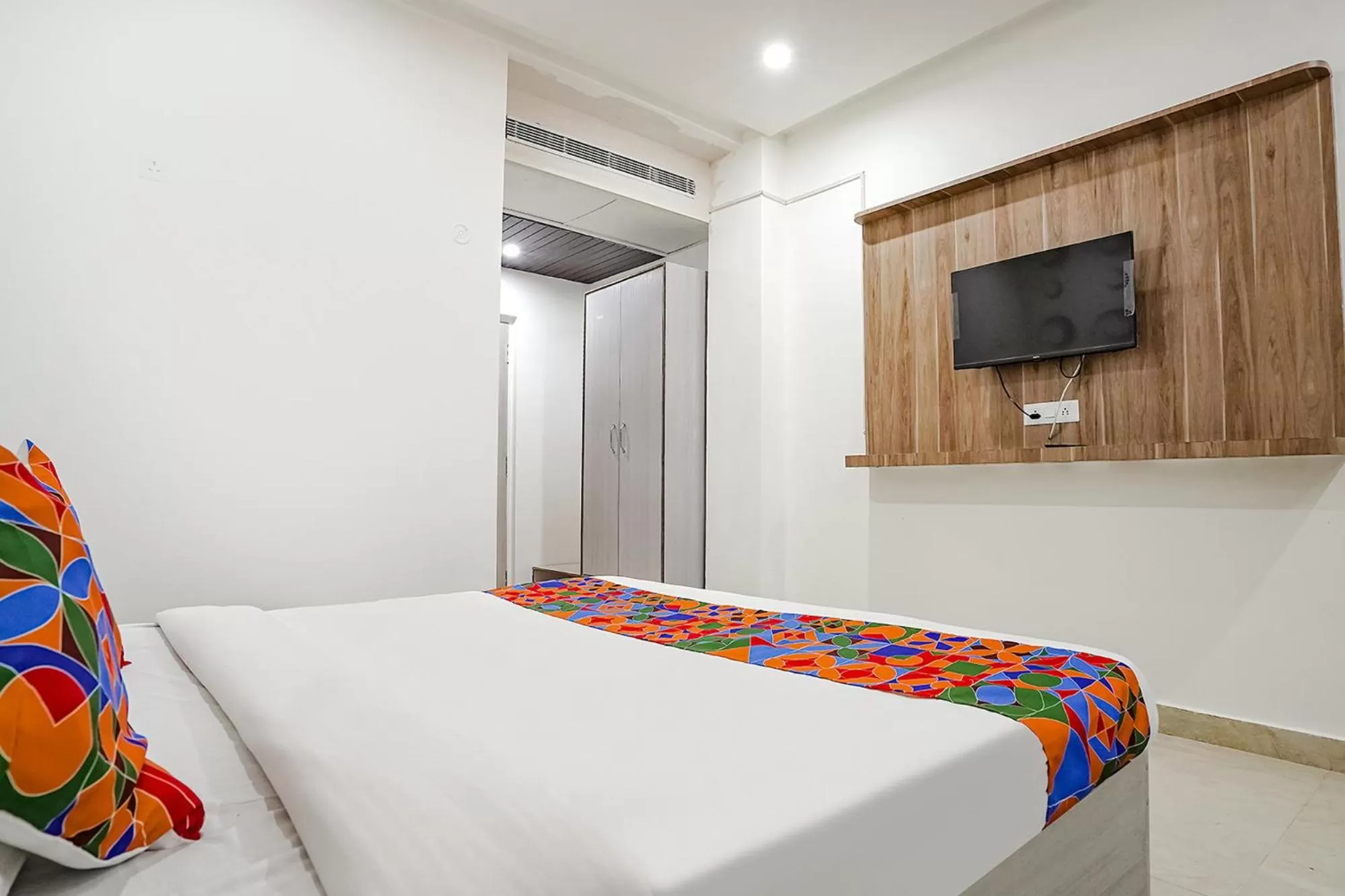 Bed in FabHotel Siddhi
