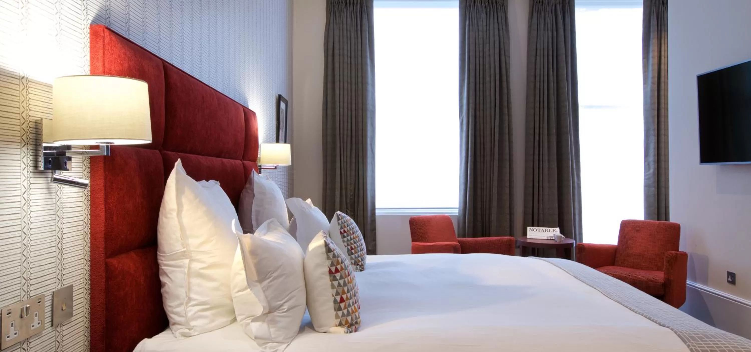 Bed in 54 Queen's Gate Hotel