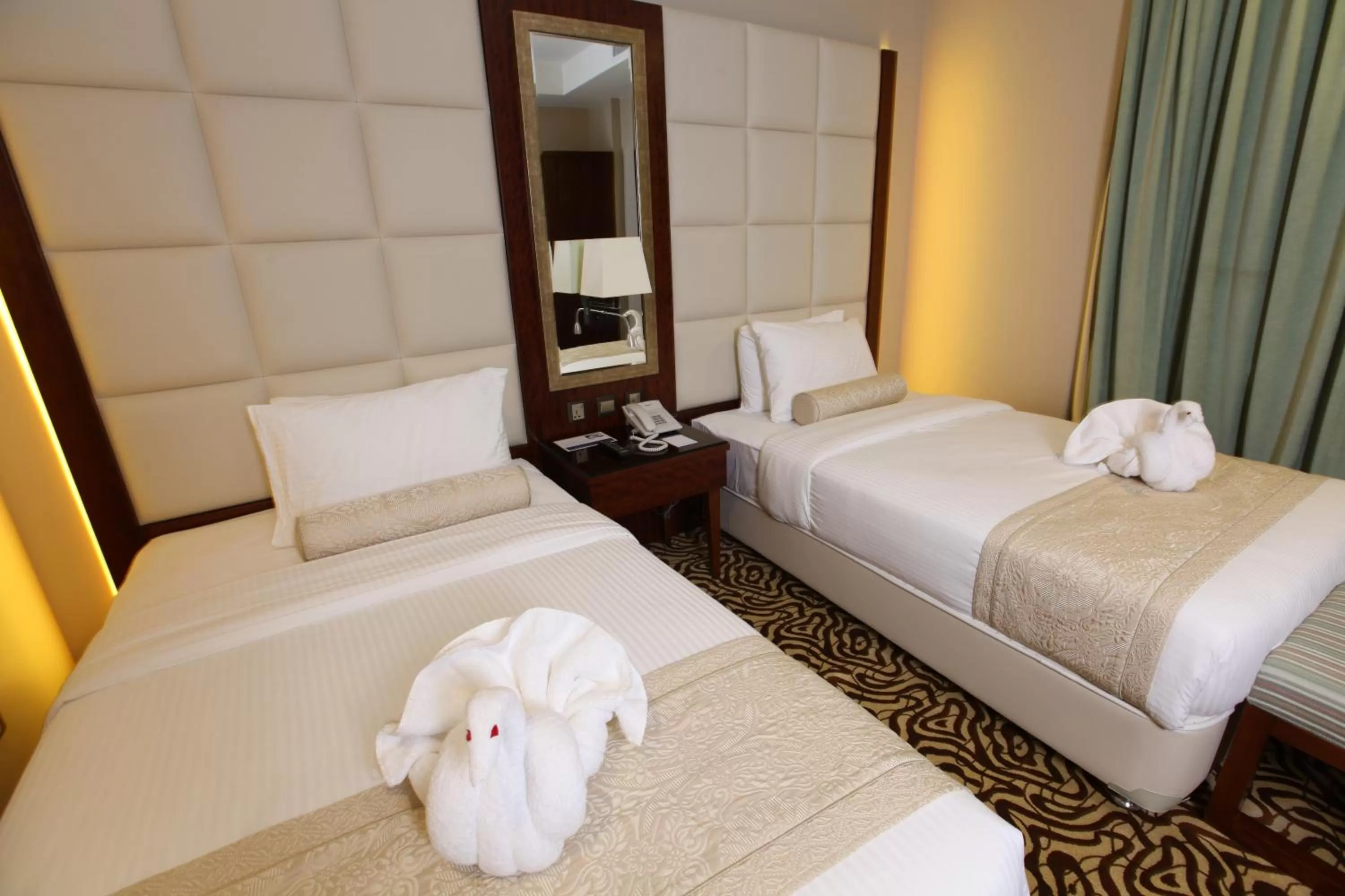 Bed in Western Lamar Hotel