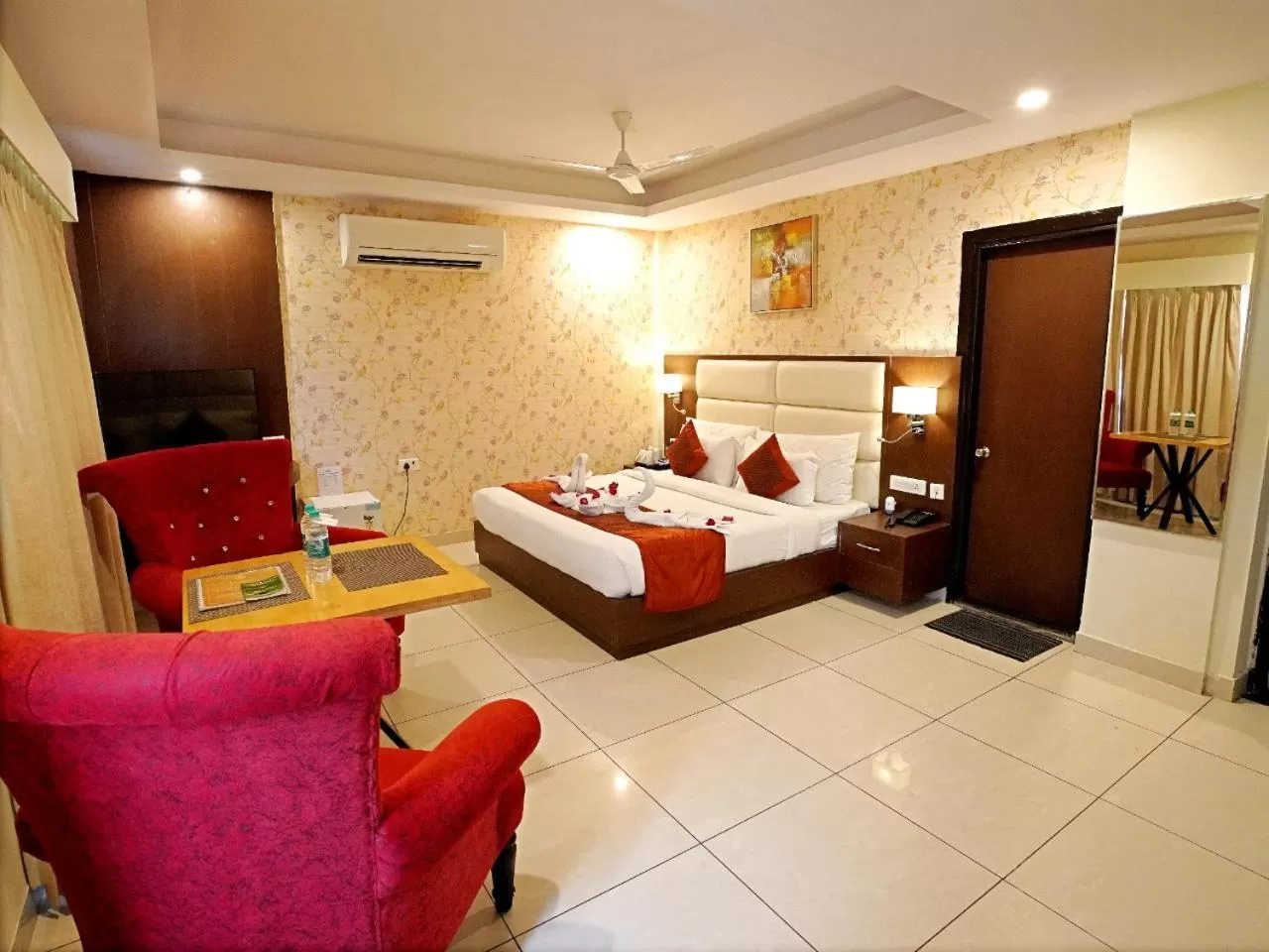 Photo of the whole room, Bed in Indira Nikunj Rubystone Exotic