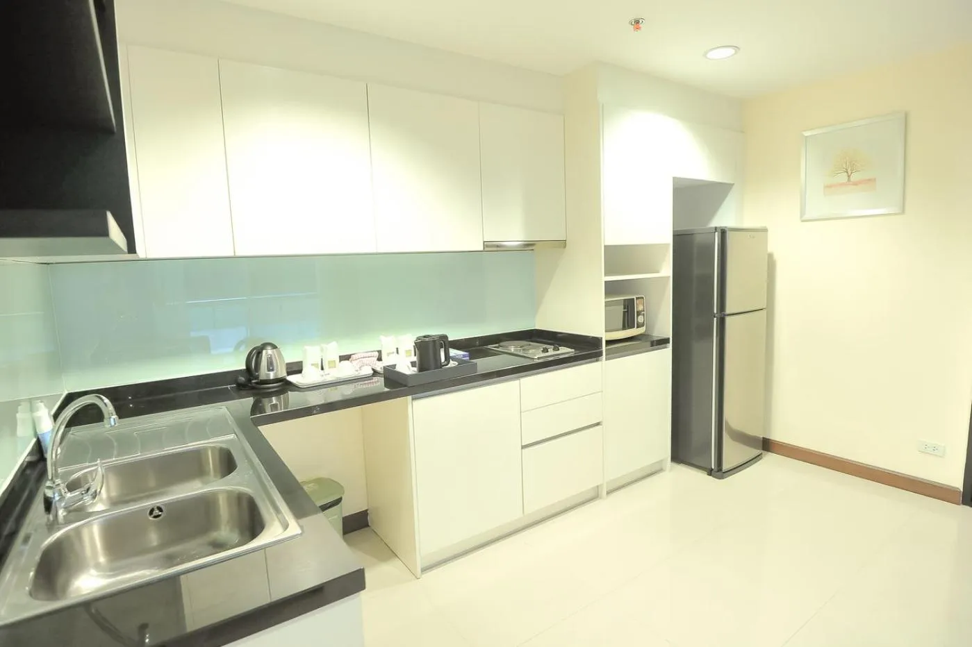 Kitchen or kitchenette in 42Grand Residence