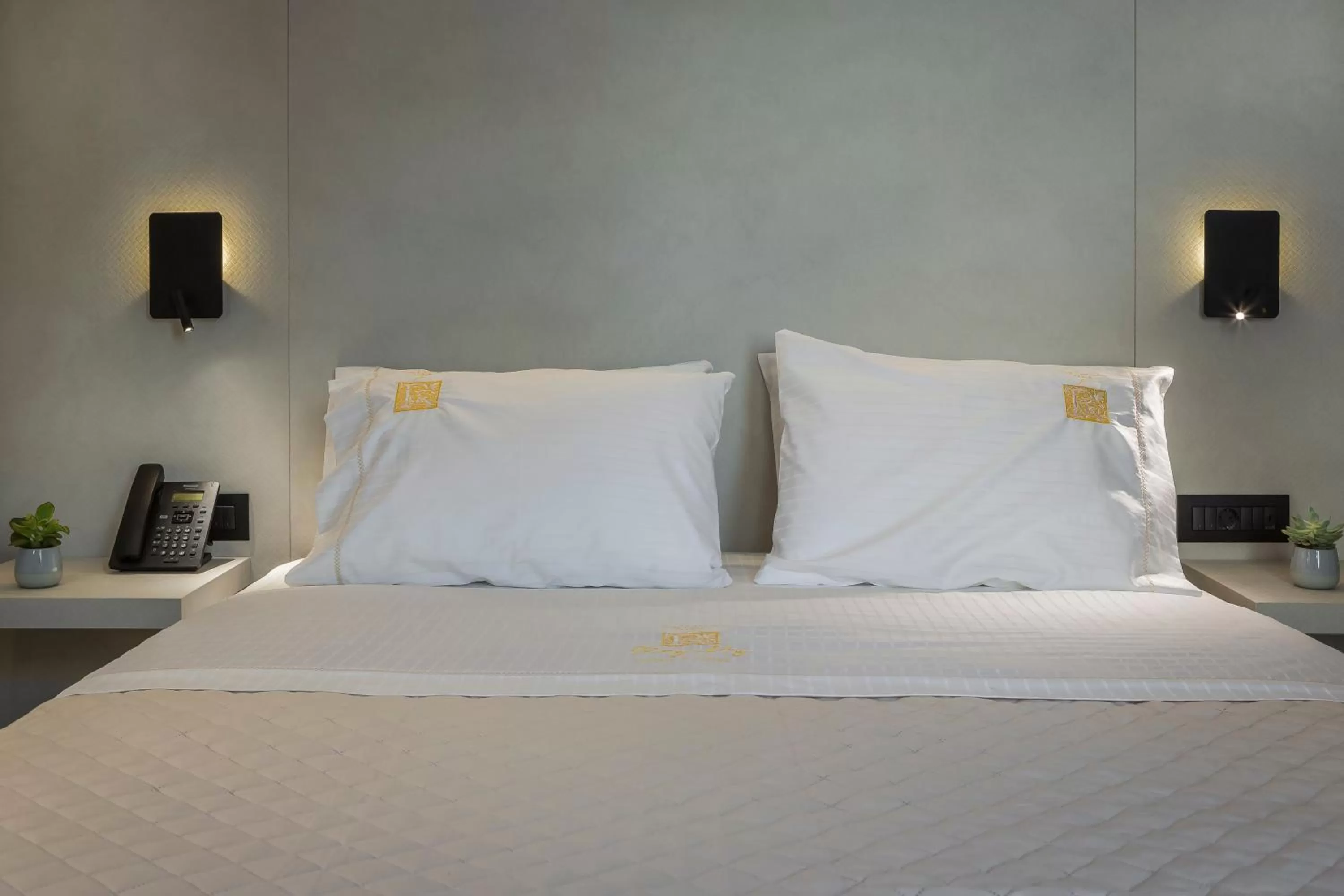 Bed in Royalty Hotel Athens