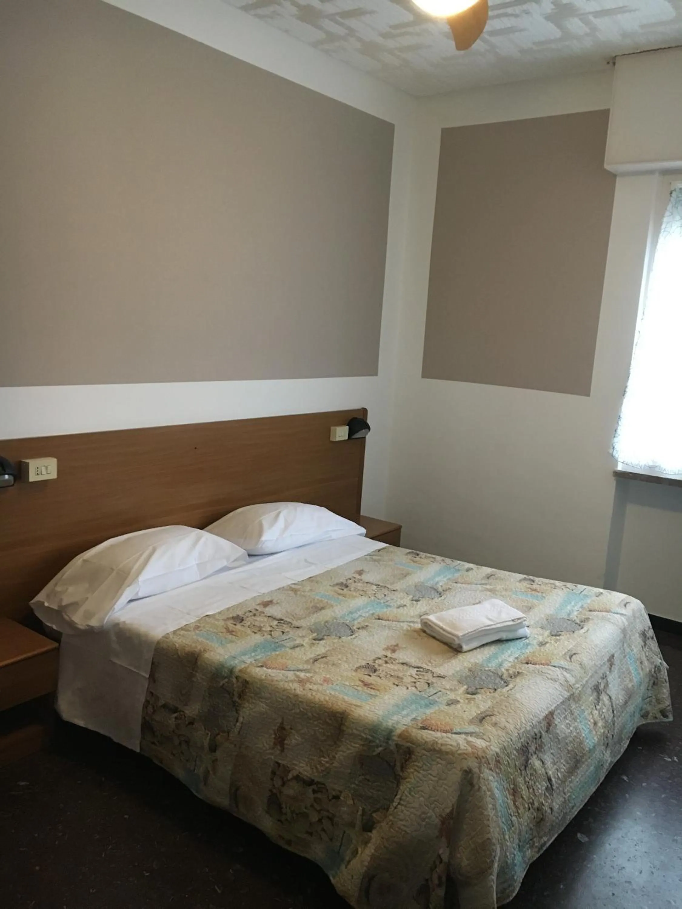 Bed in Hotel Miramare