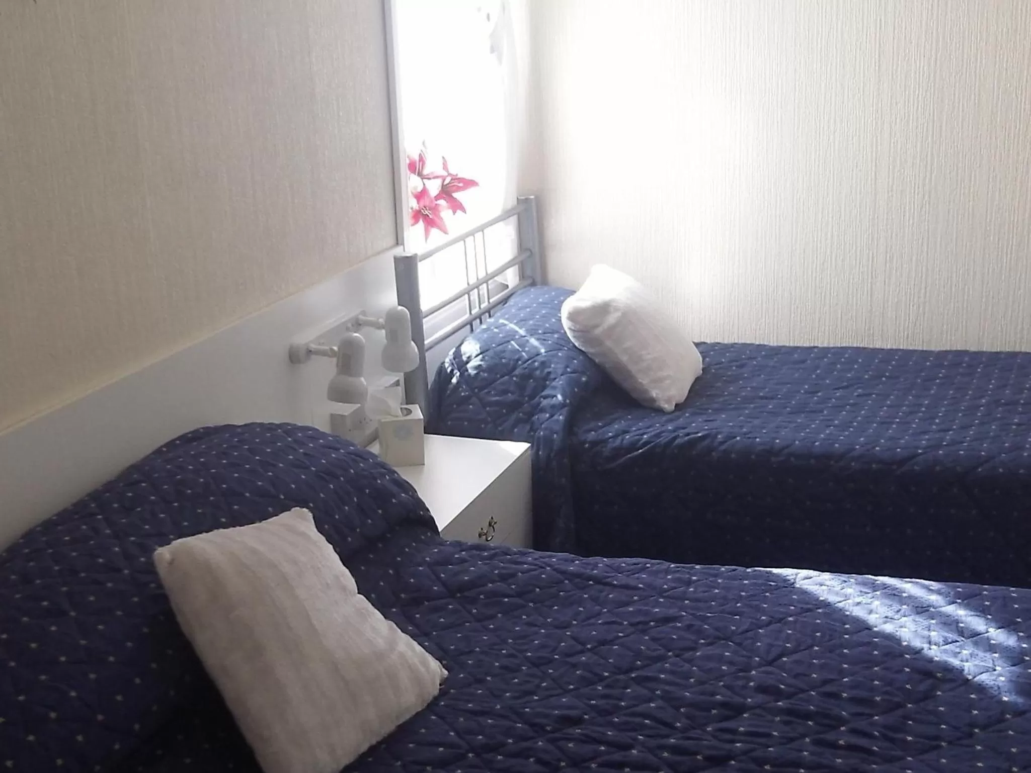 Bed in Ivydene Guest House