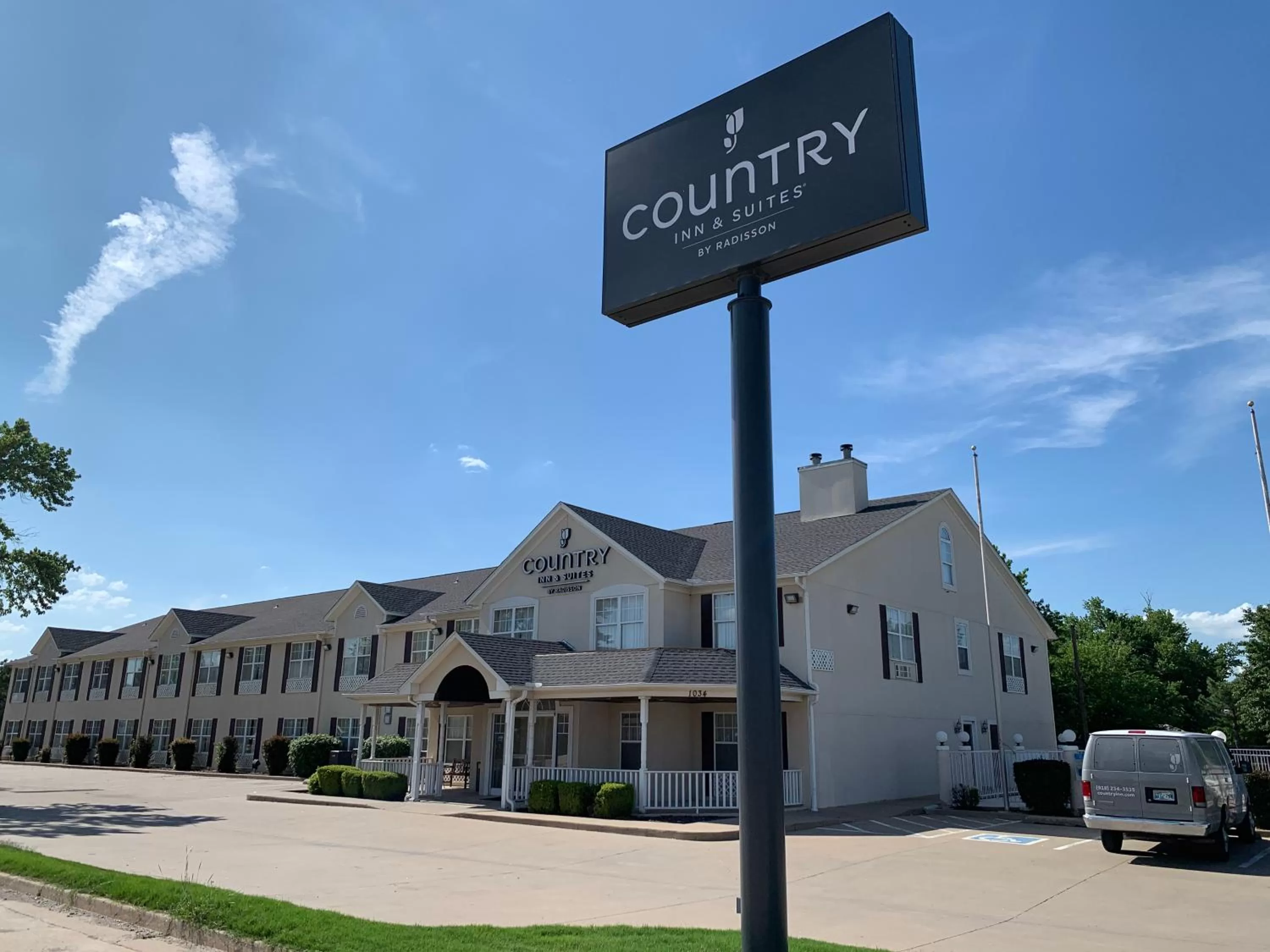 Property logo or sign in Country Inn & Suites by Radisson, Tulsa, OK