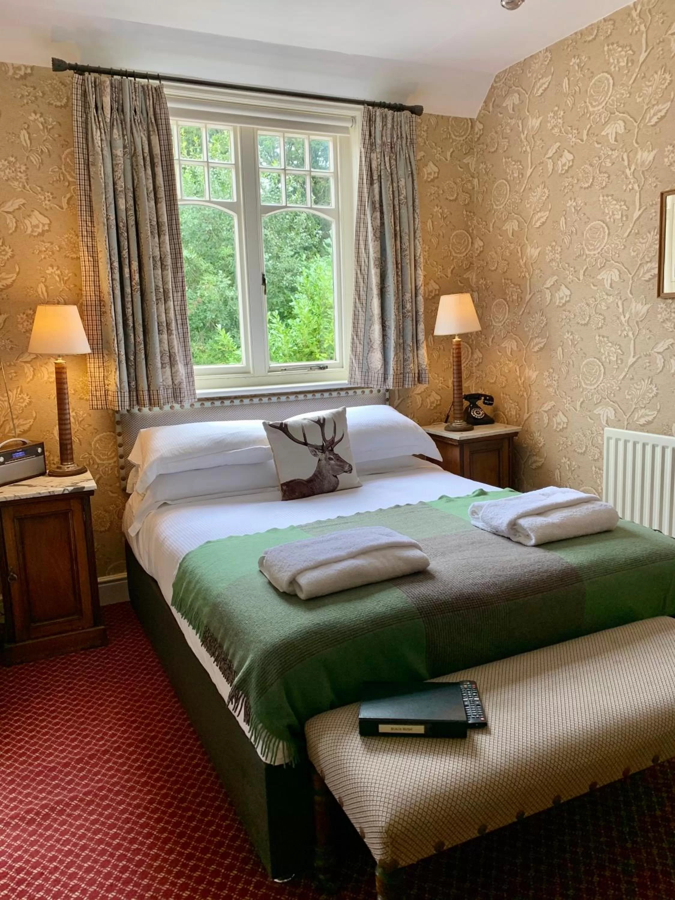 Bed in The Stag and Huntsman at Hambleden